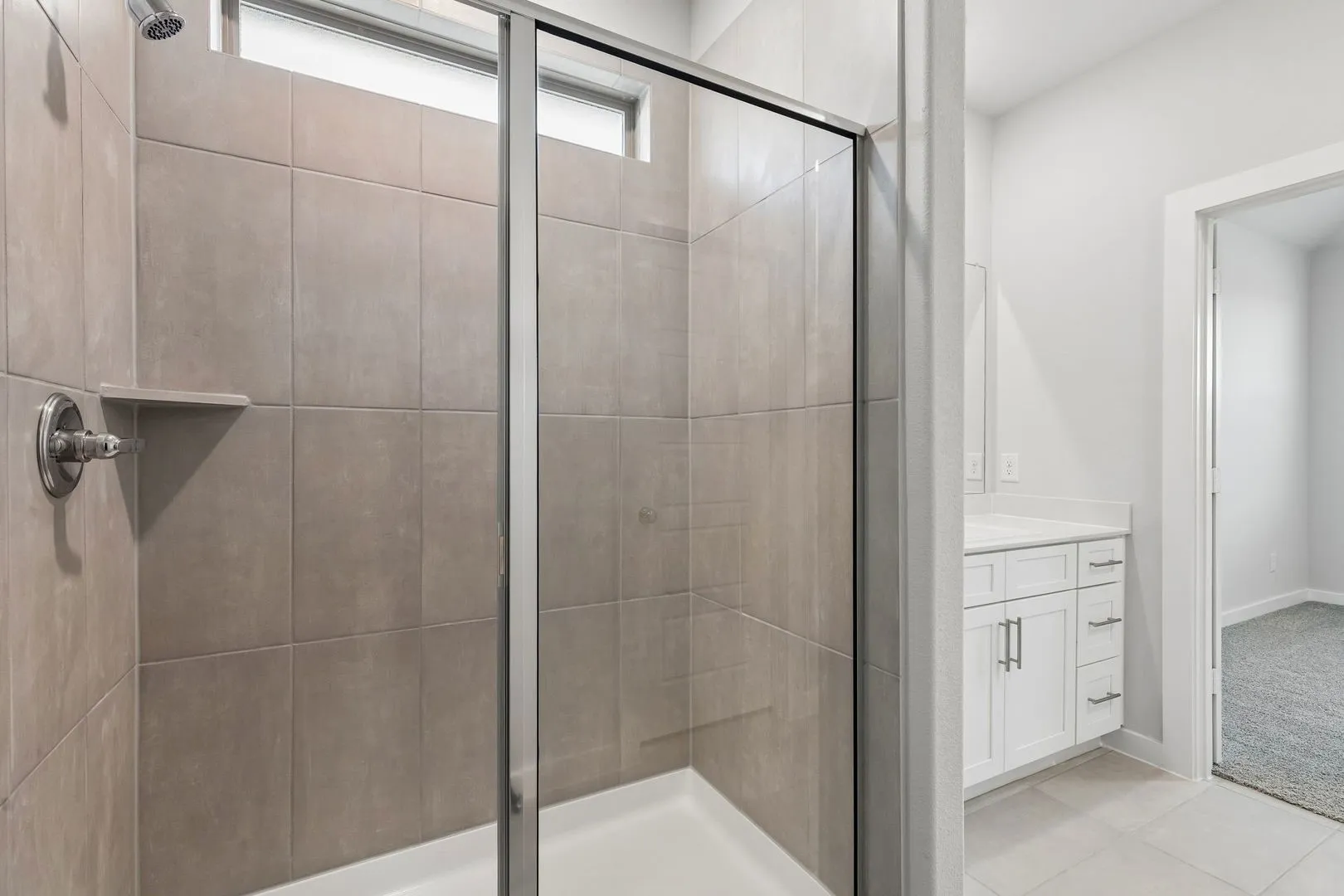 Primary Bathroom in the Cypress home plan by Trophy Signature Homes - REPRESENTATIVE PHOTO
