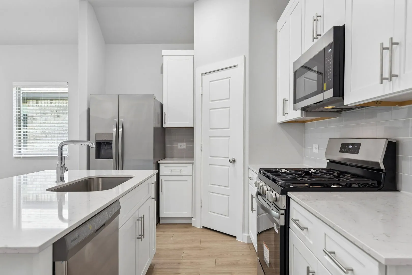 Kitchen in the Cypress home plan by Trophy Signature Homes - REPRESENTATIVE PHOTO