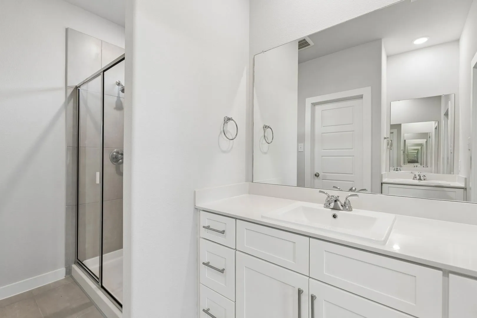 Primary Bathroom in the Cypress home plan by Trophy Signature Homes - REPRESENTATIVE PHOTO