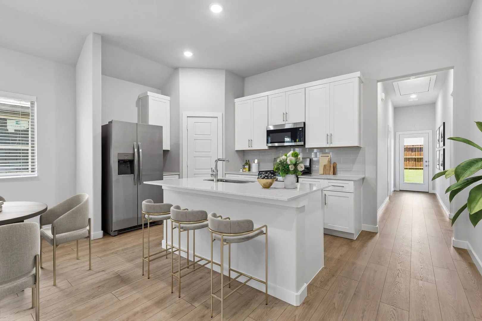 Kitchen in the Cypress home plan by Trophy Signature Homes - REPRESENTATIVE PHOTO