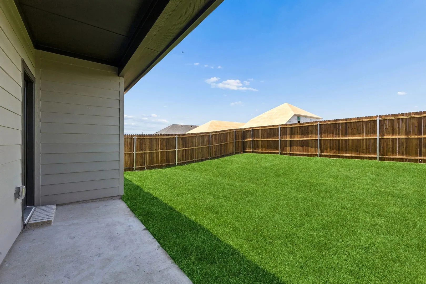 Covered Patio in the Cypress home plan by Trophy Signature Homes - REPRESENTATIVE PHOTO