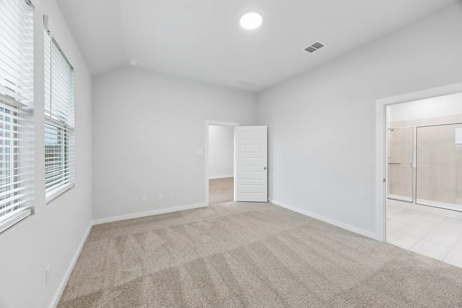 Primary Suite in the Cedar home plan by Trophy Signature Homes – REPRESENTATIVE PHOTO