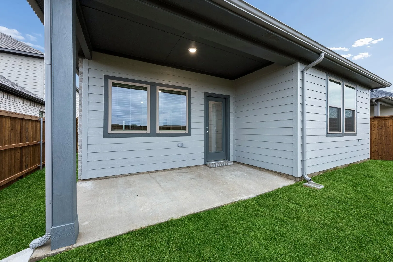 Covered Patio in the Cedar home plan by Trophy Signature Homes – REPRESENTATIVE PHOTO
