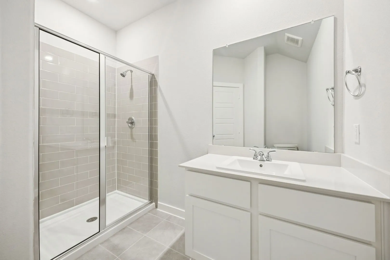 Bathroom in the Masters home plan by Trophy Signature Homes – REPRESENTATIVE PHOTO