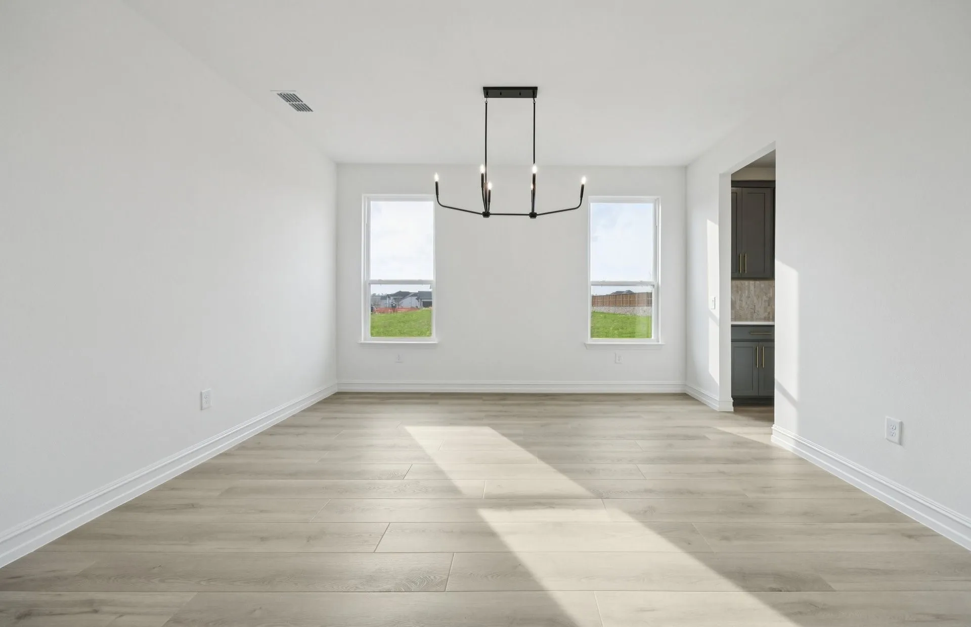 *Floorplan representation, not actual home - Formal dining room with large windows