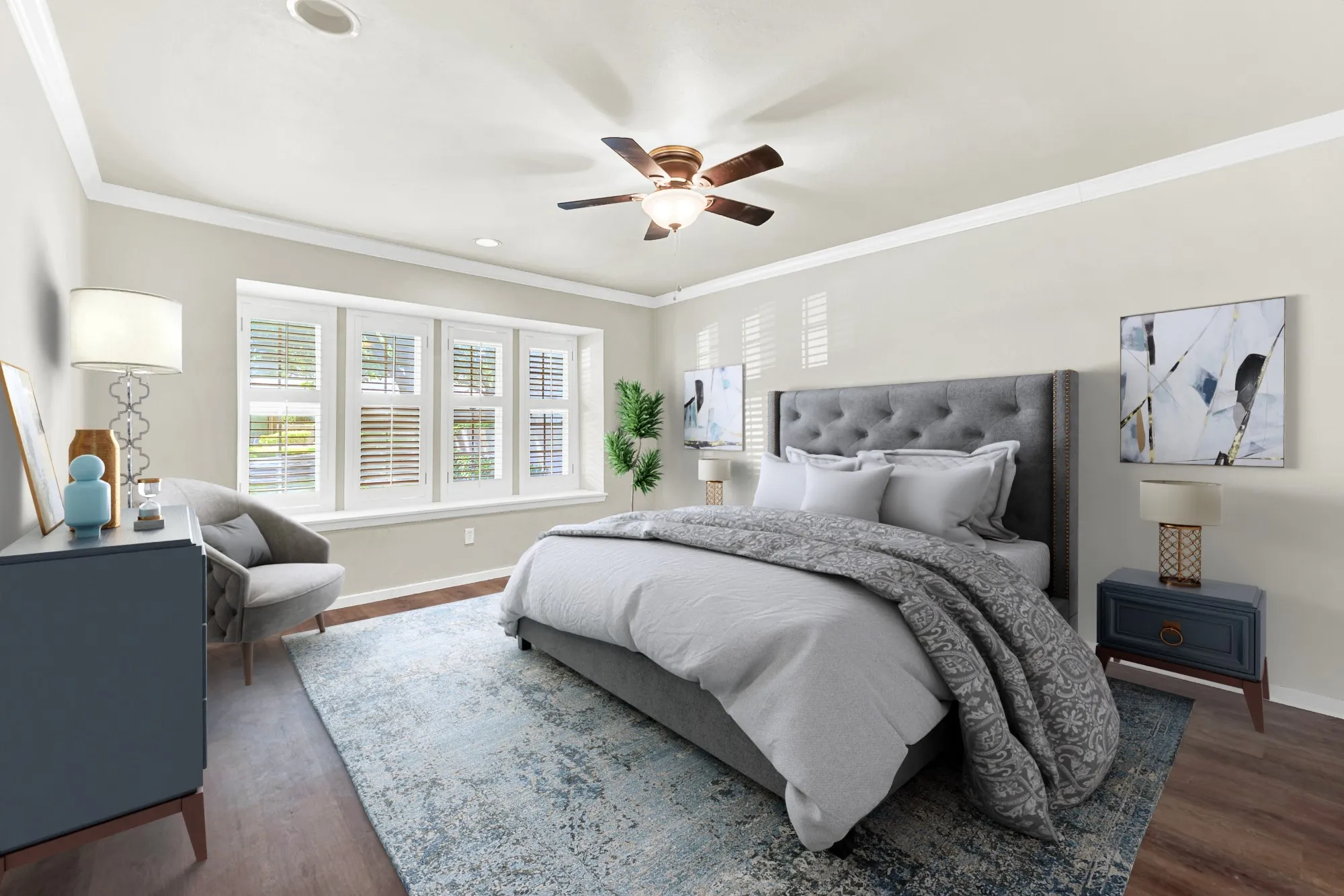 Warm neutral wall tones, crown molding, and wood-finish flooring