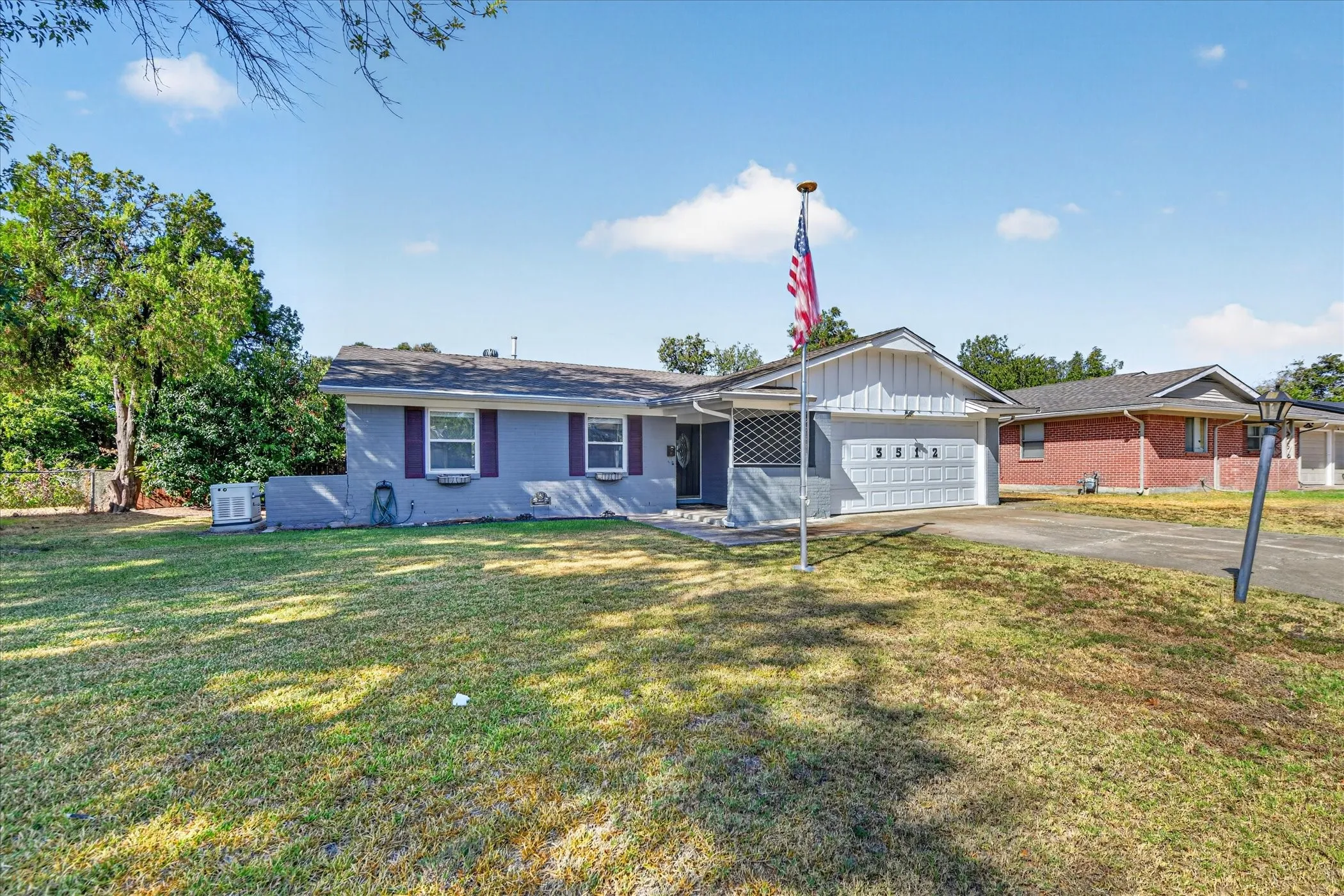 Large front yard with covered porch