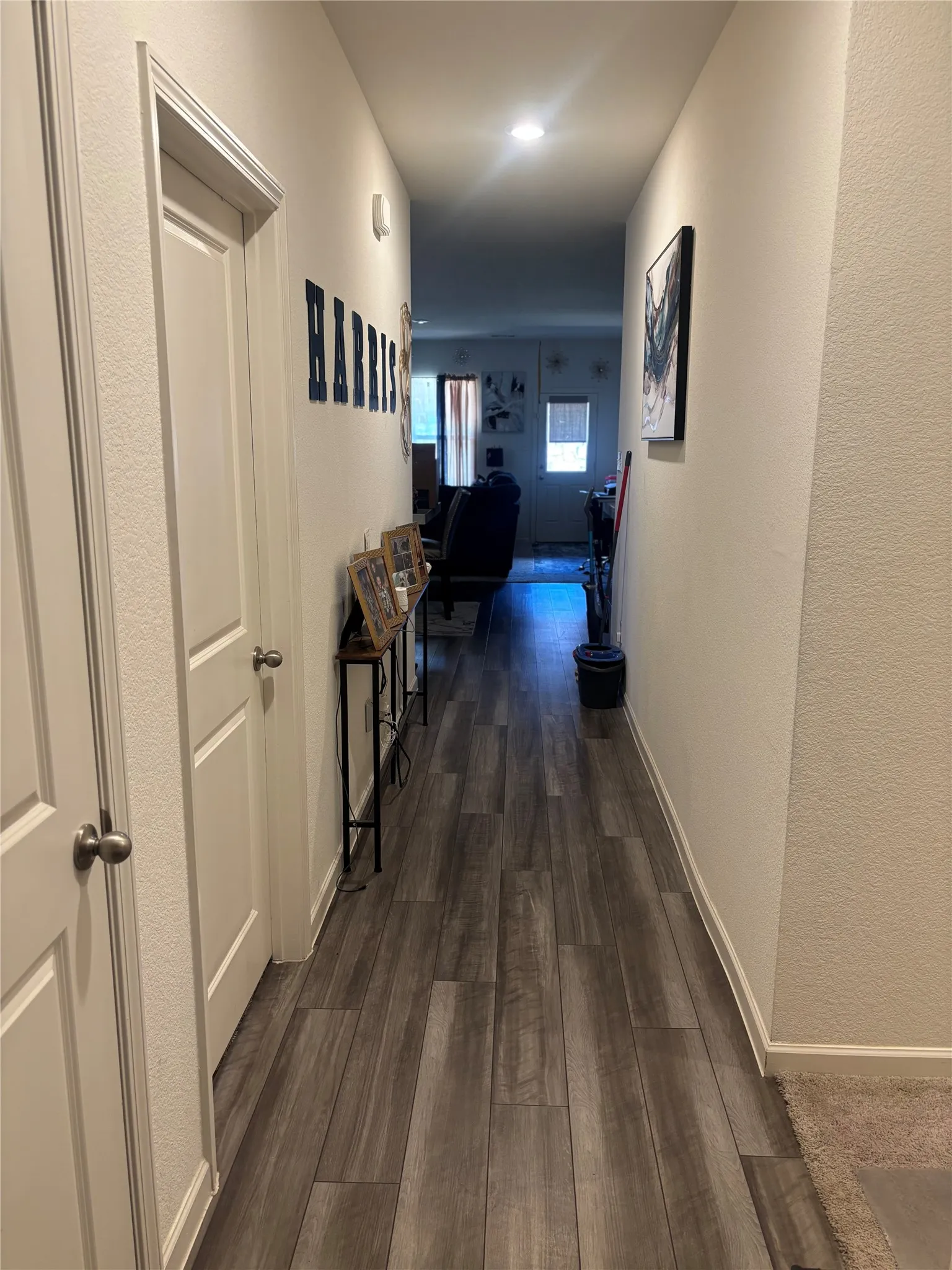 Wood-finish plank flooring throughout