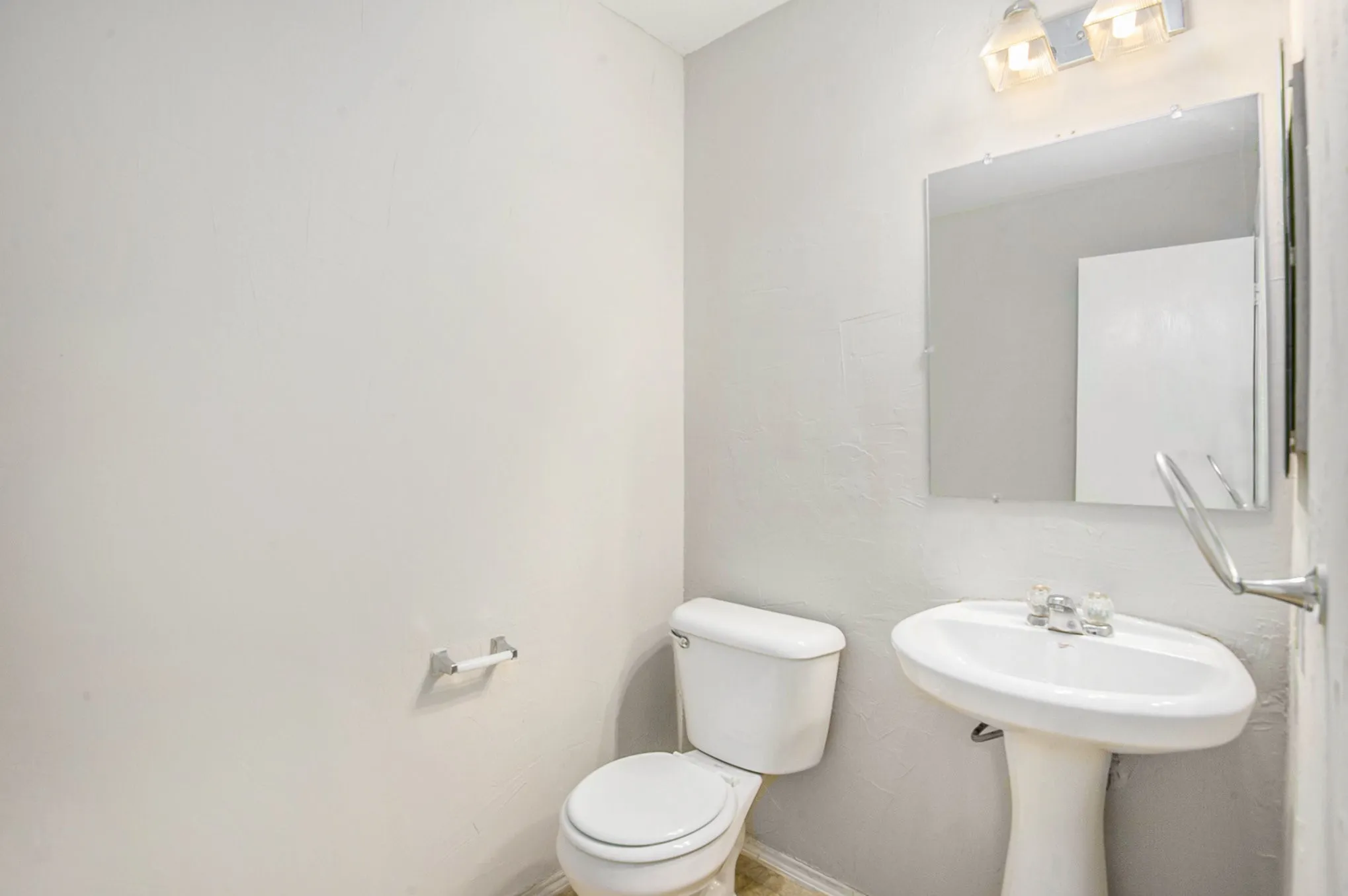 Half bathroom featuring toilet