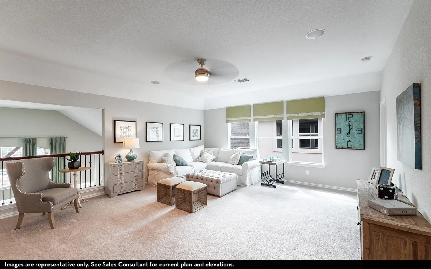 Carpeted loft space with ample natural light, recessed lighting, and a ceiling fan