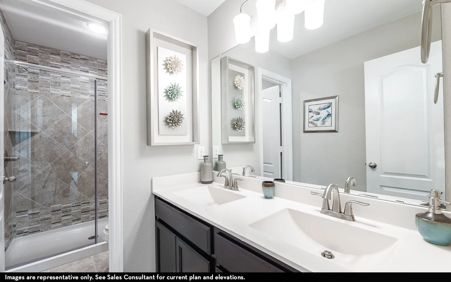 Dual vanity with undermount sinks, brushed nickel faucets, and a large mirror