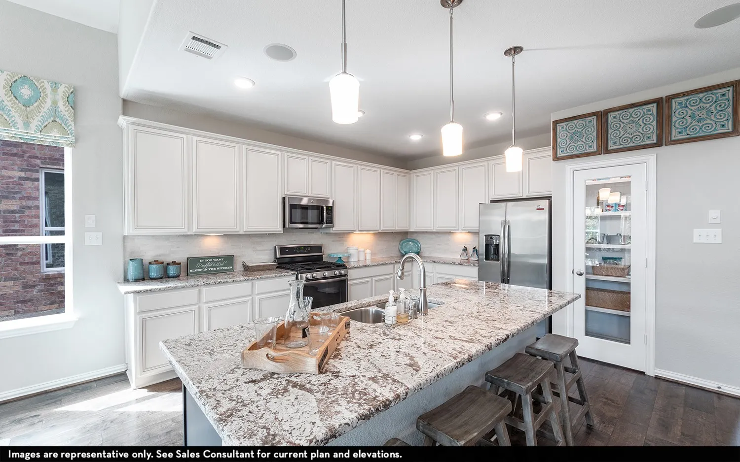 Kitchen featuring an expansive island with a polished countertop, stainless steel appliances, white cabinetry, pendant lighting, and dark wood-finish flooring