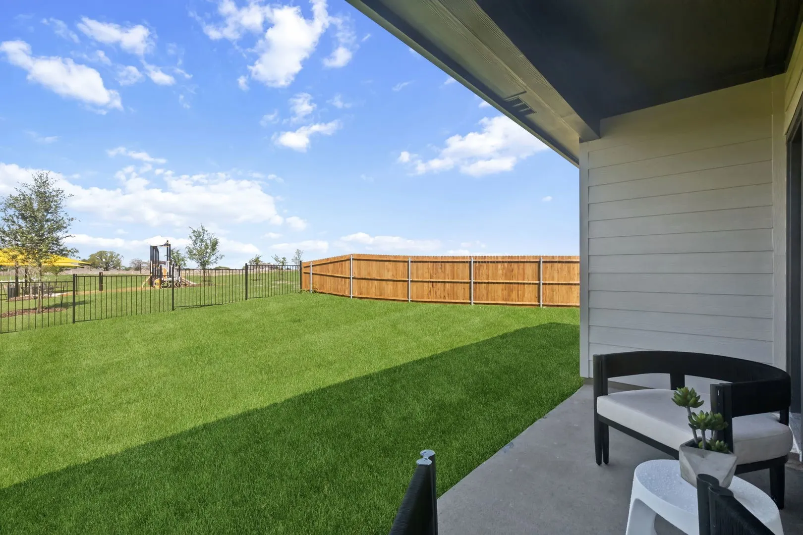 Patio in the Magnolia home plan by Trophy Signature Homes – REPRESENTATIVE PHOTO