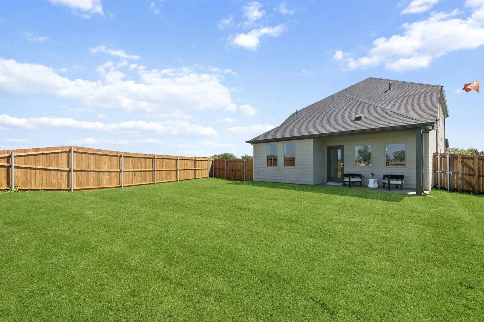 Backyard in the Magnolia home plan by Trophy Signature Homes – REPRESENTATIVE PHOTO