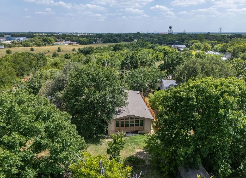 Expansive natural surroundings with mature trees