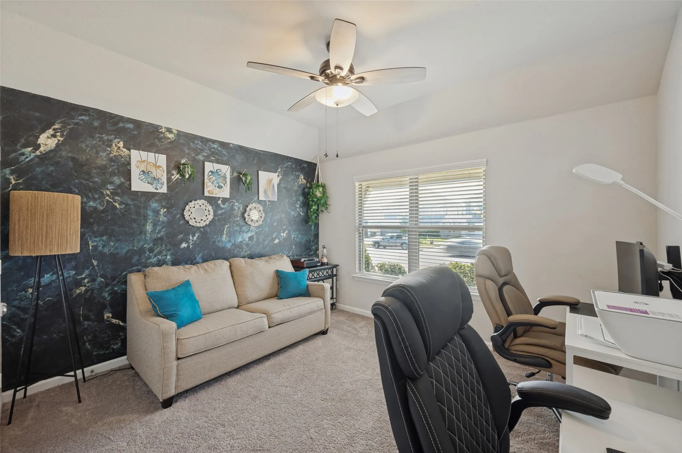 Recessed lighting and ceiling fan overhead