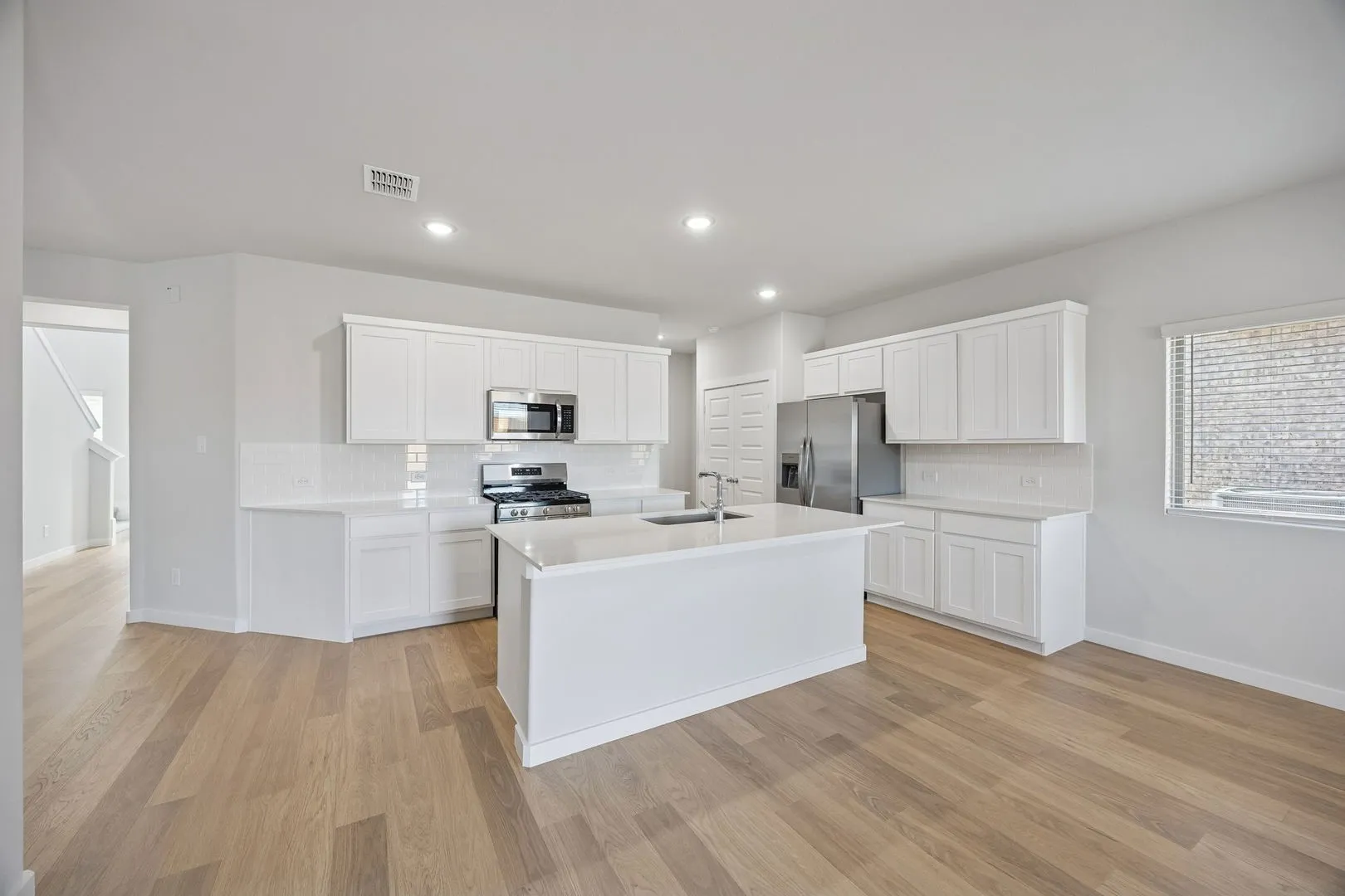 Kitchen in the Oak II home plan by Trophy Signature Homes – REPRESENTATIVE PHOTO