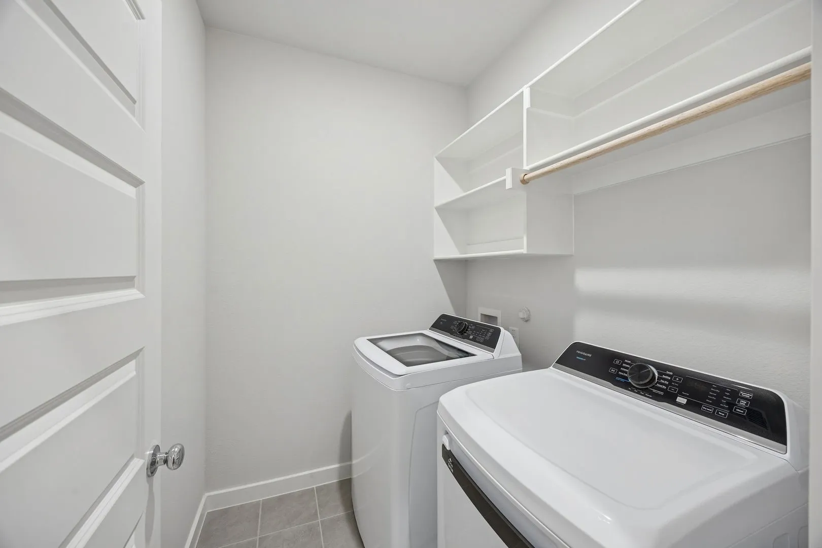 Utility room in the Oak II home plan by Trophy Signature Homes – REPRESENTATIVE PHOTO