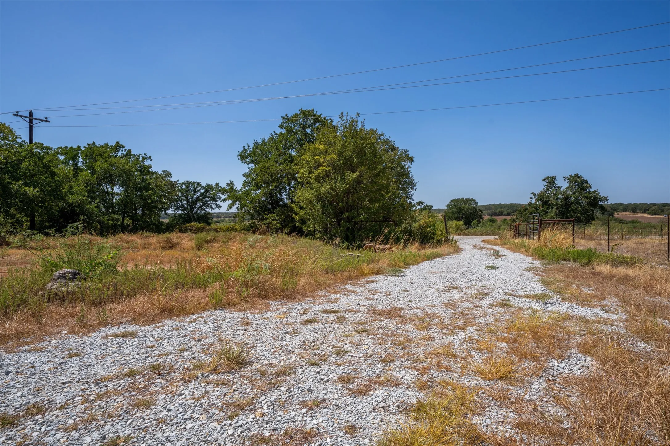 Gravel driveway and perimeter fencing