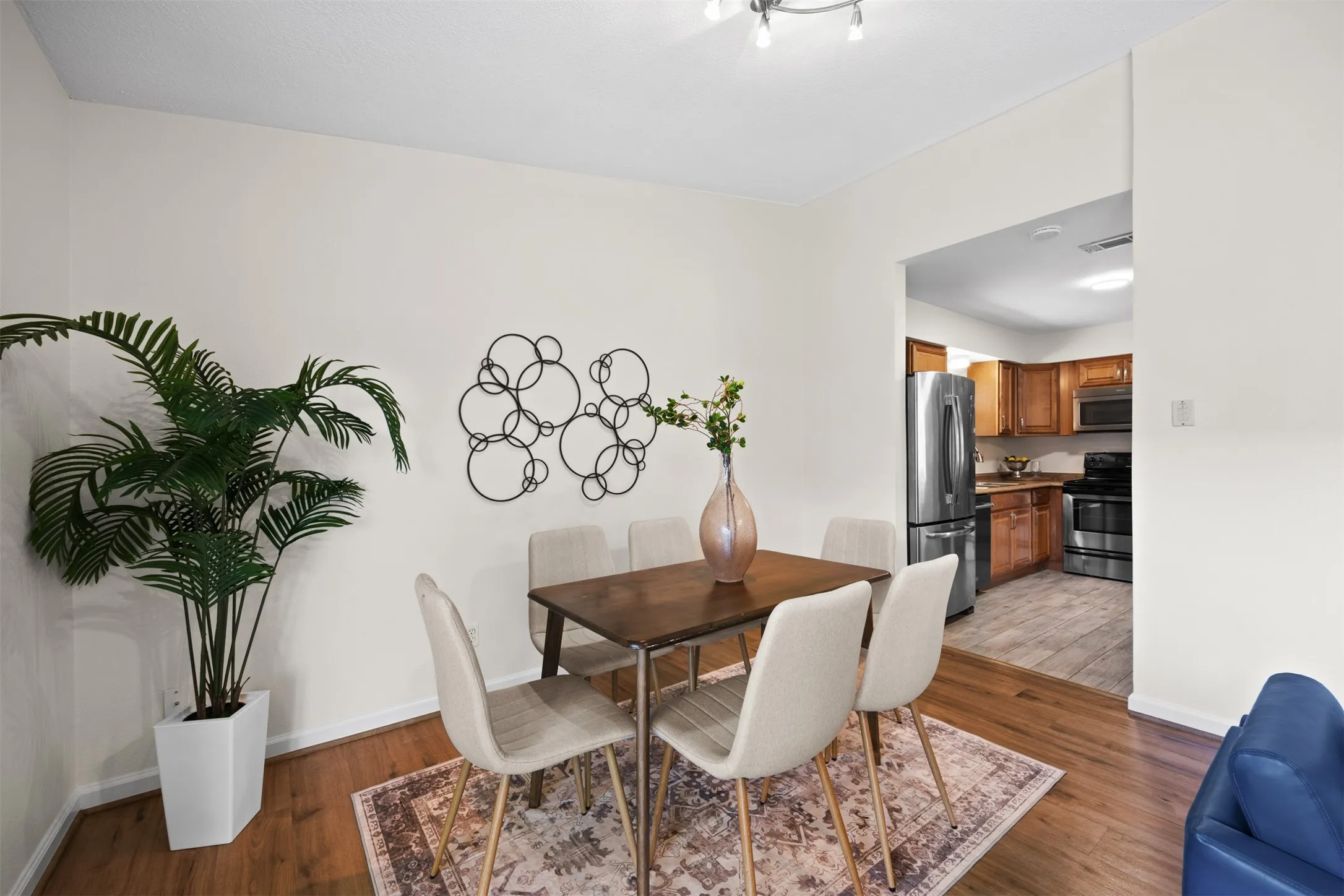 Hardwood-style flooring in dining area
