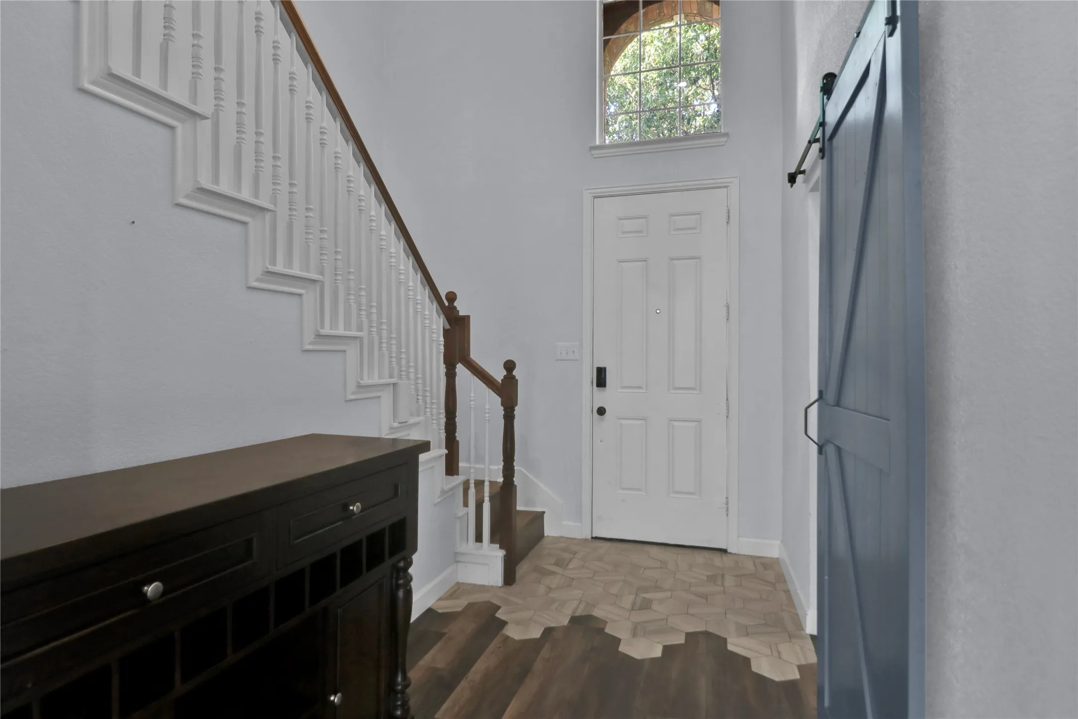 Front view of home. Barn door for easy room access.