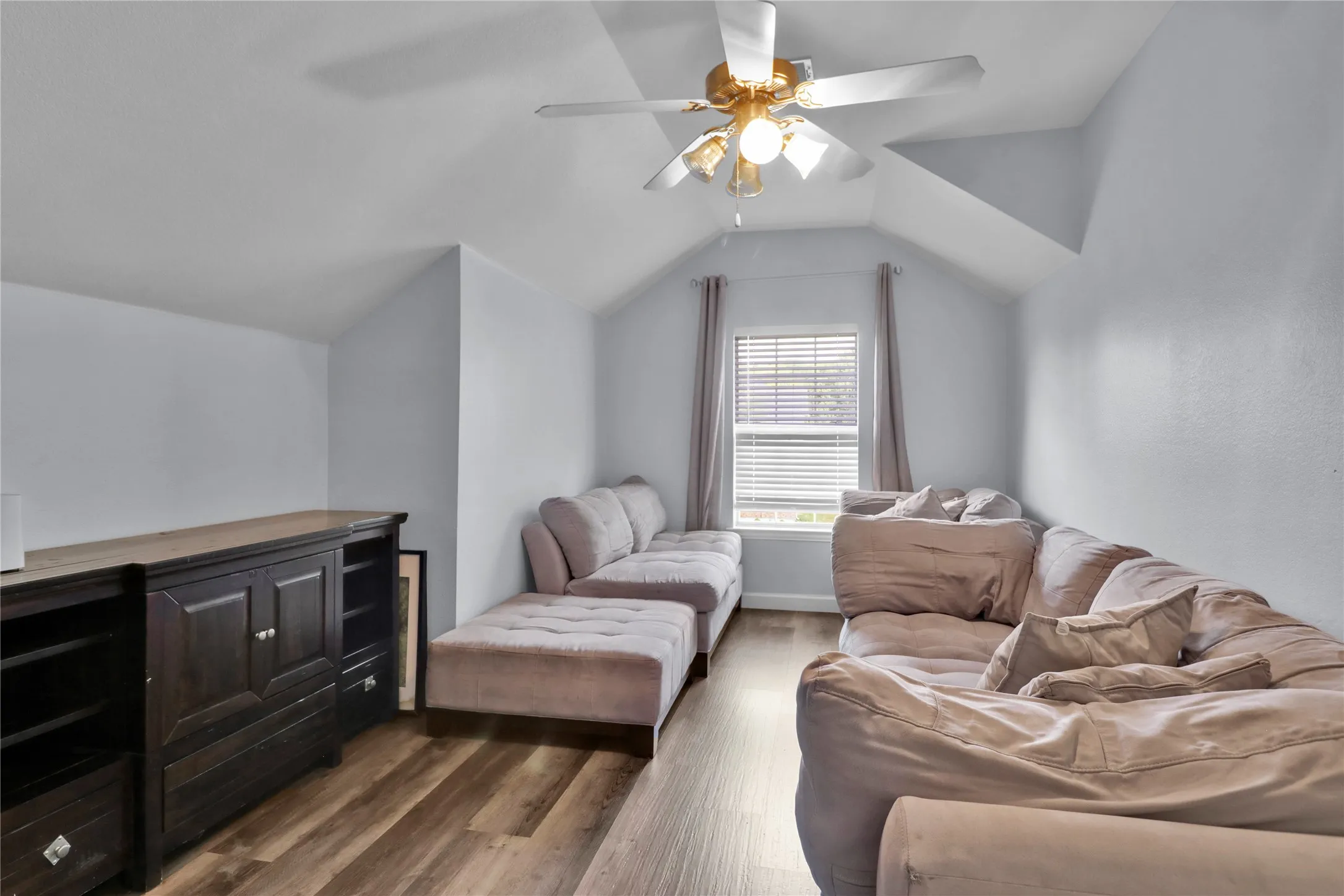Upstairs living space could be play room or media room.