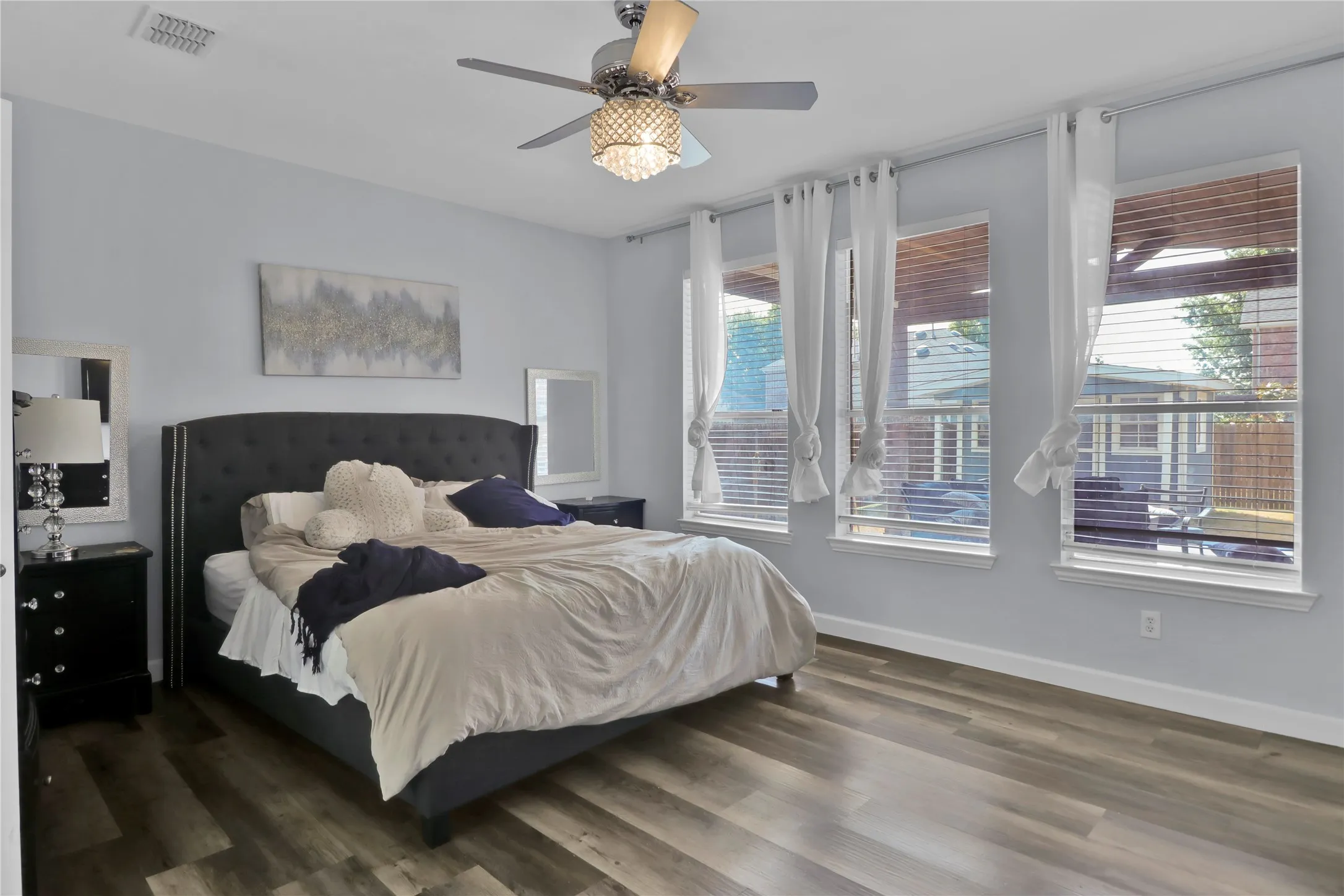 Master bedroom overlooks back yard.