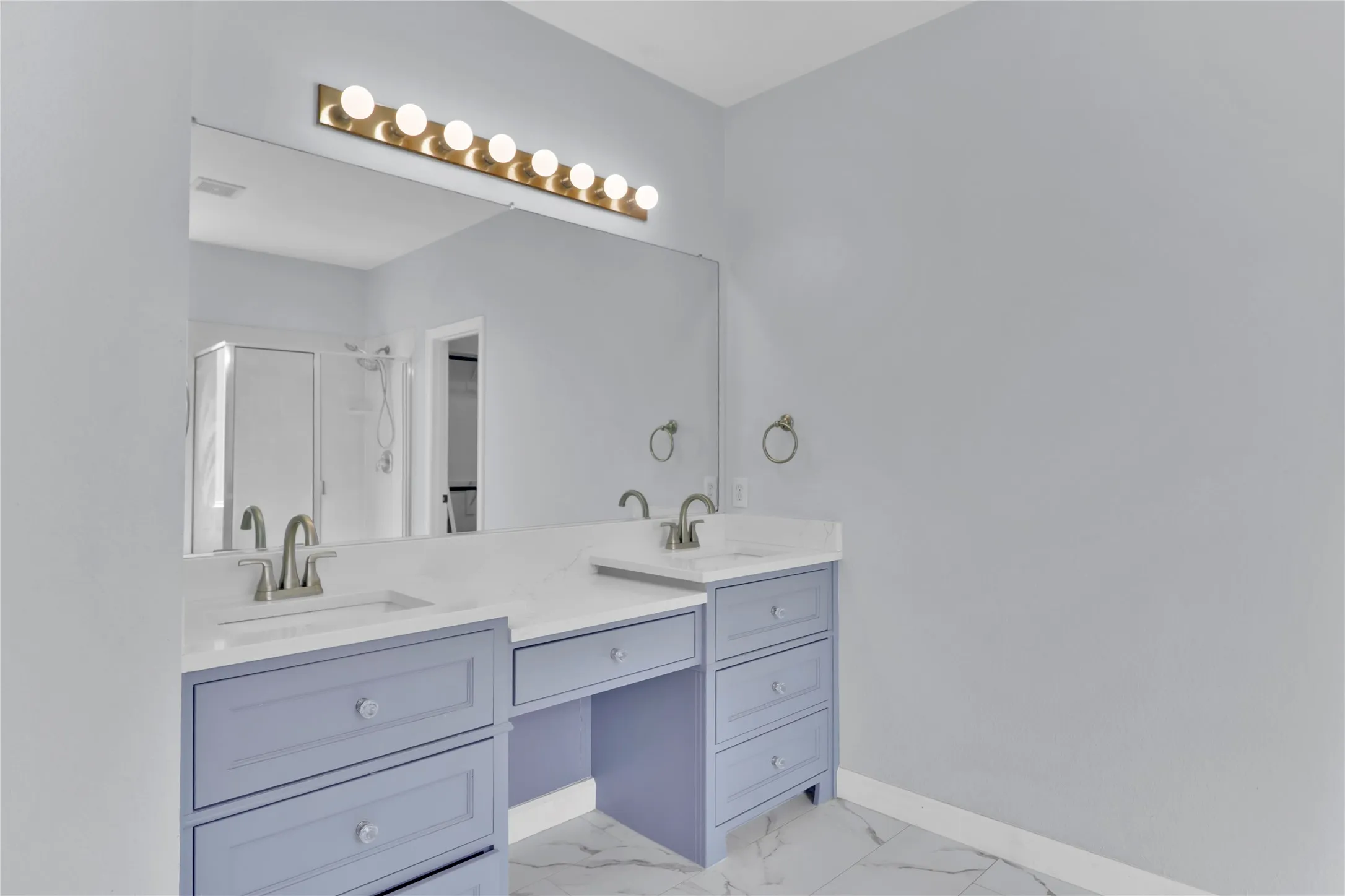 Dual sinks in master vanity.