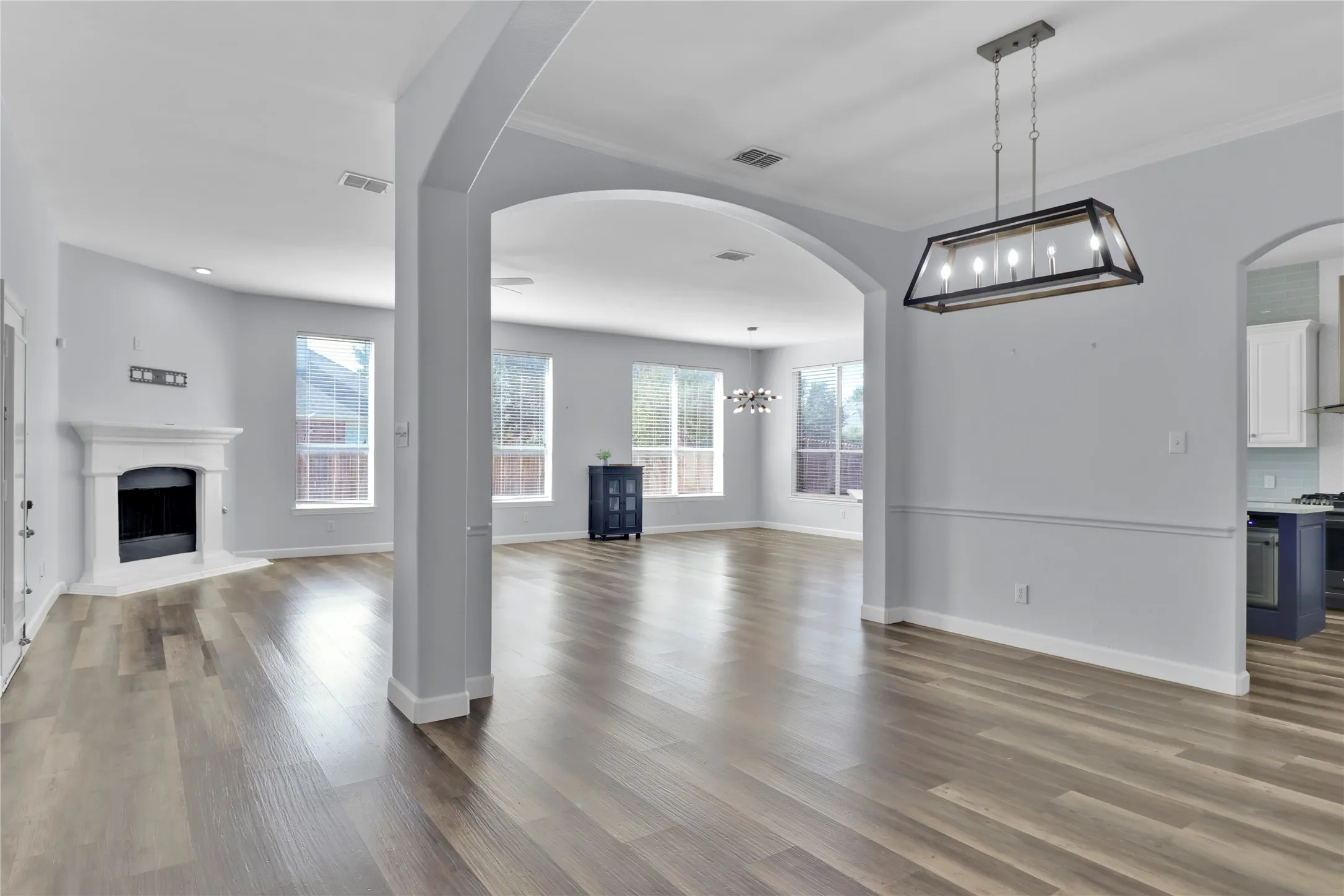 Formal dining, living room with fireplace and breakfast room.