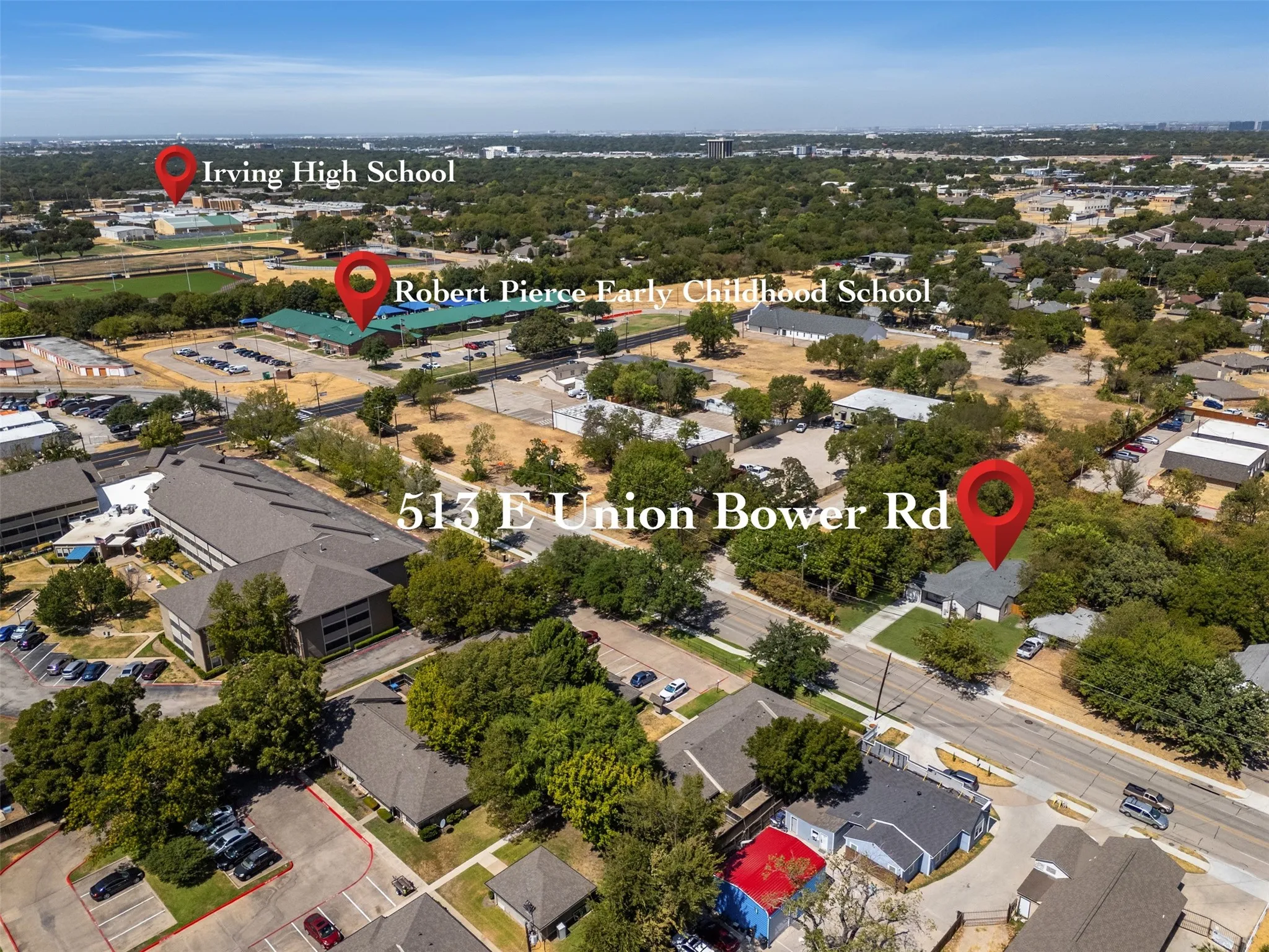 Aerial perspective of the property at 513 E Union Bower Rd, featuring surrounding residential and institutional buildings