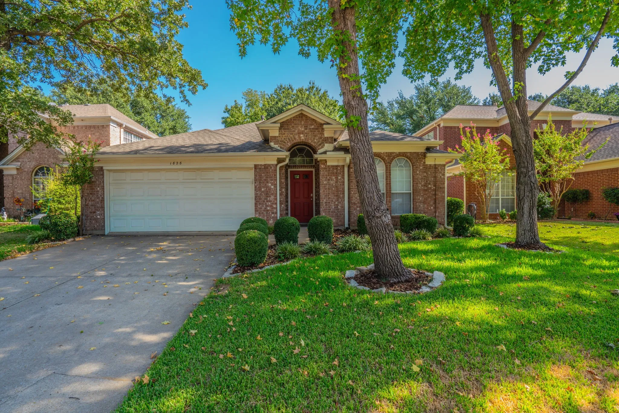 Welcome home to 1828 Newton Drive in Flower Mound - quiet neighborhood with trees and no HOA!
