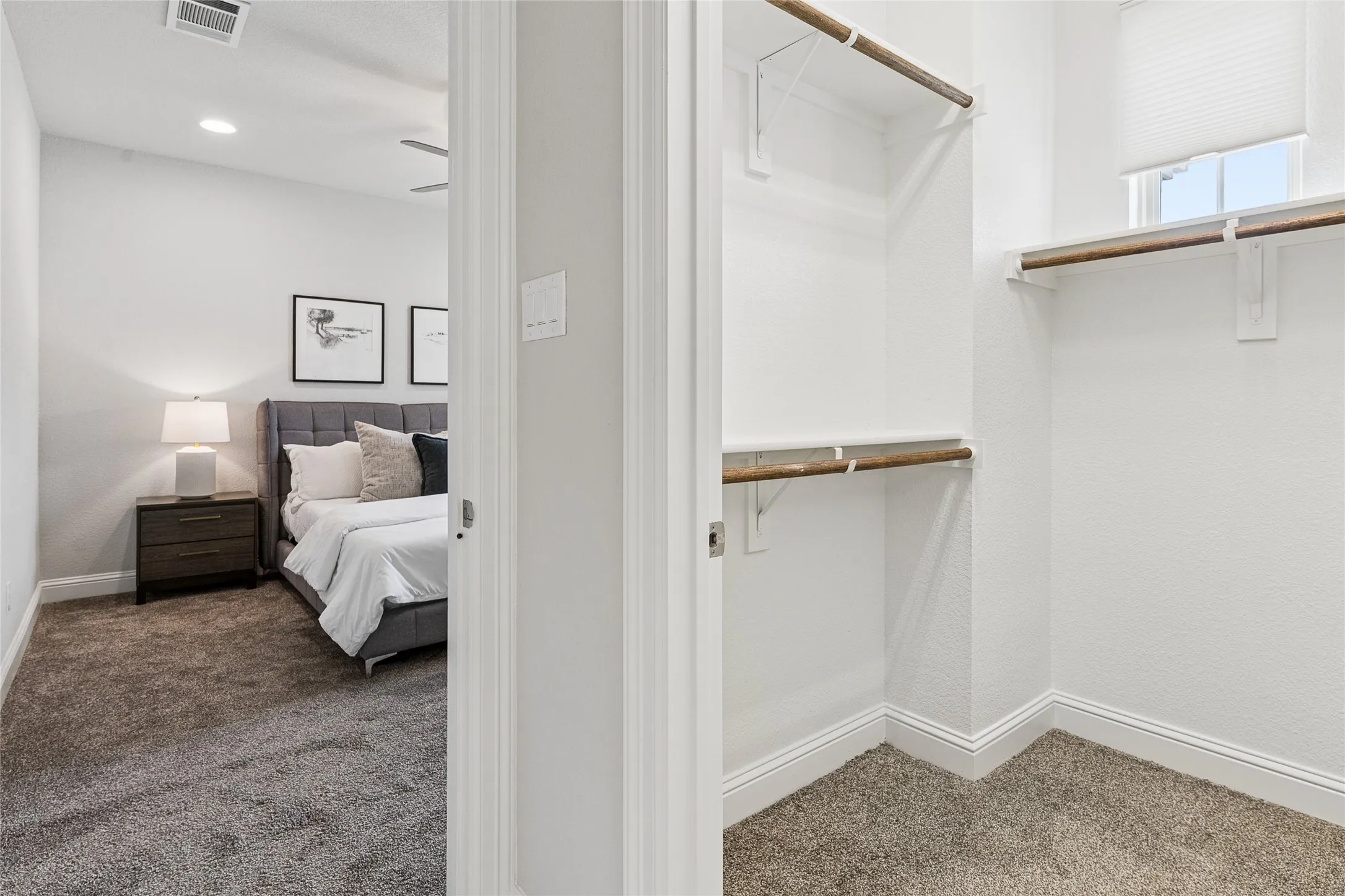 Primary bedroom features two spacious closets.