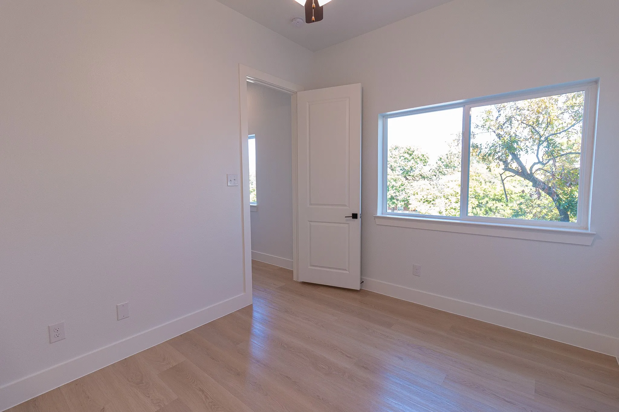 Spare room featuring light hardwood / wood-style floors