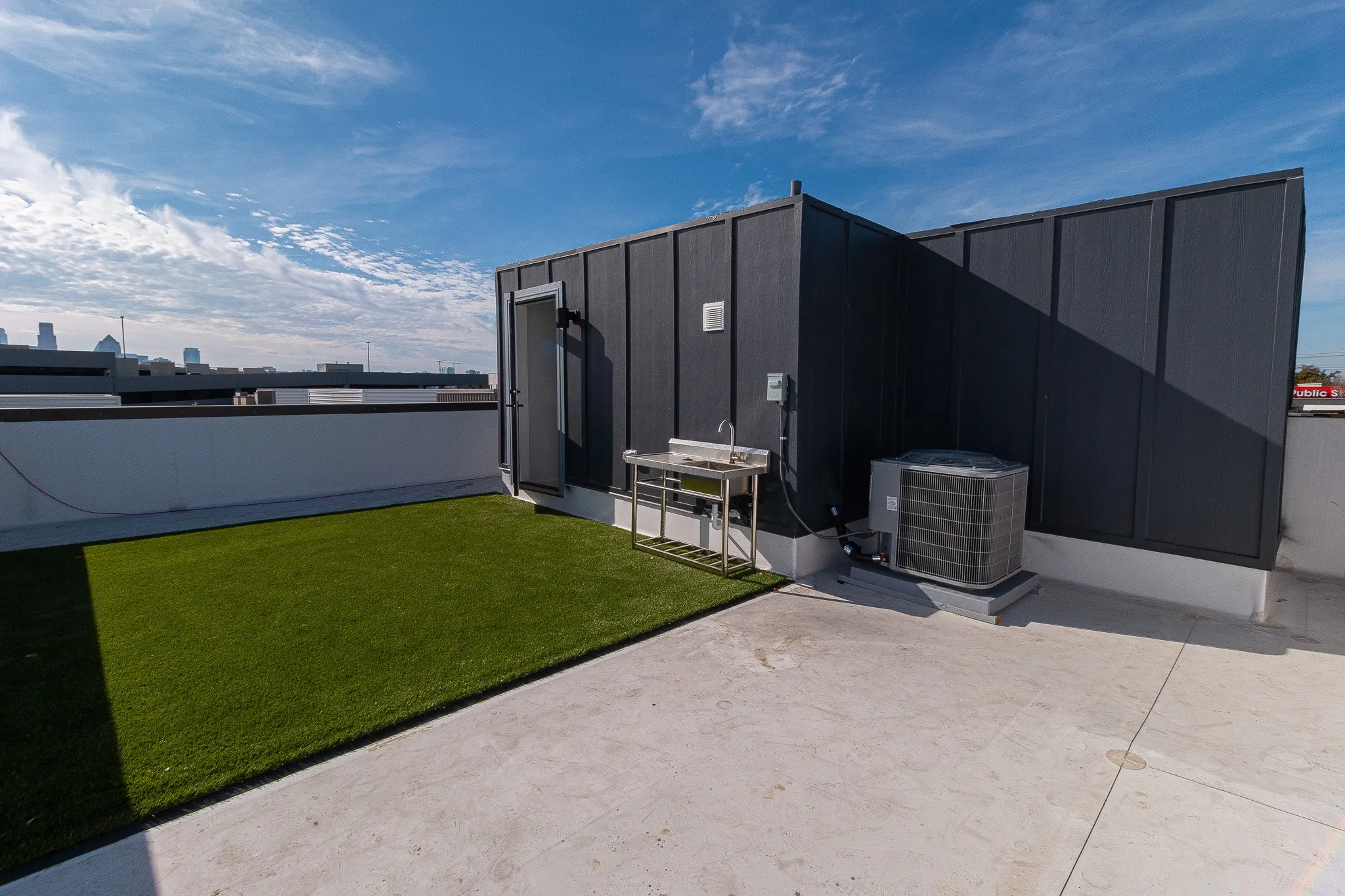 View of yard featuring central air condition unit and a patio