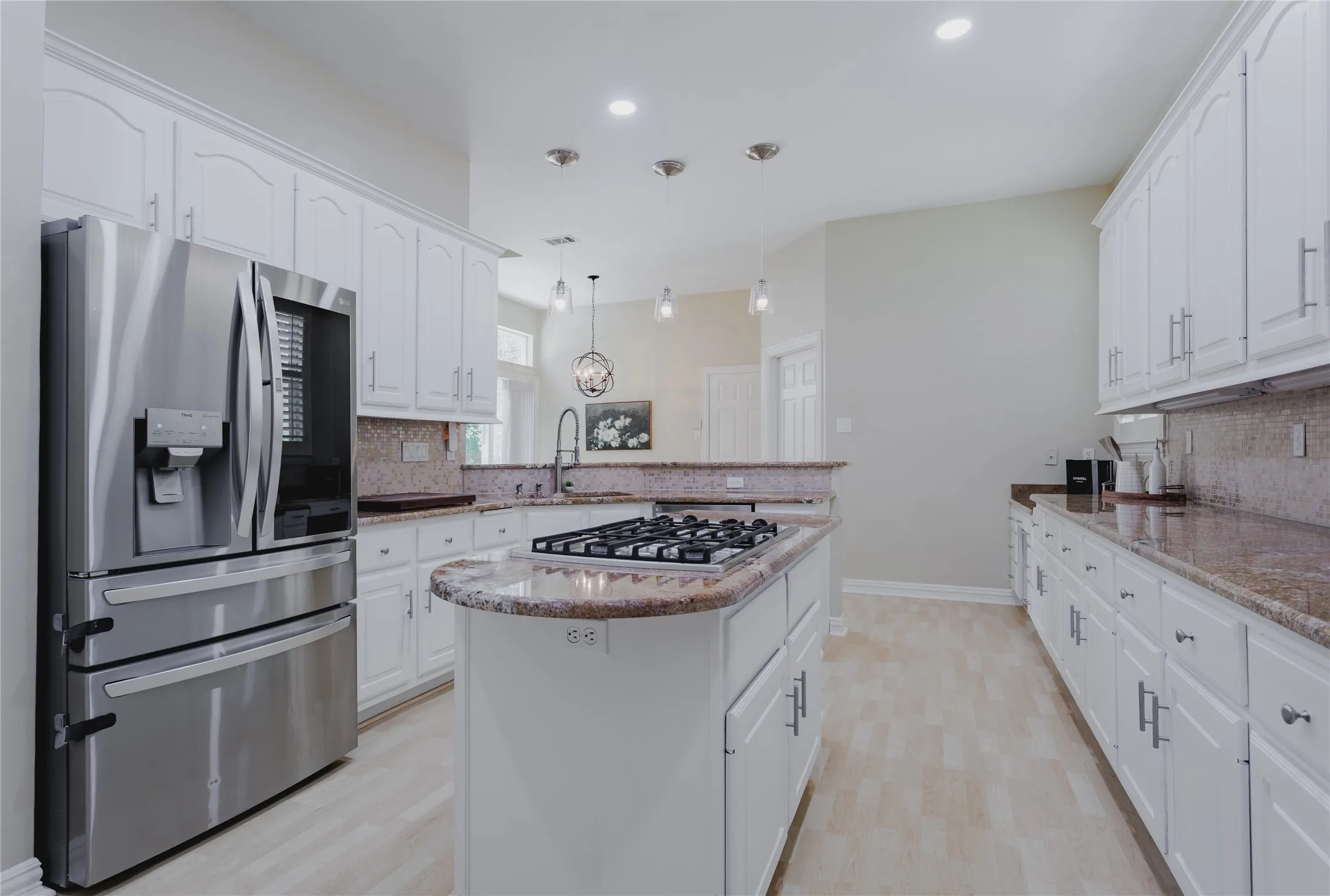 Open Kitchen with Views to Breakfast Room.