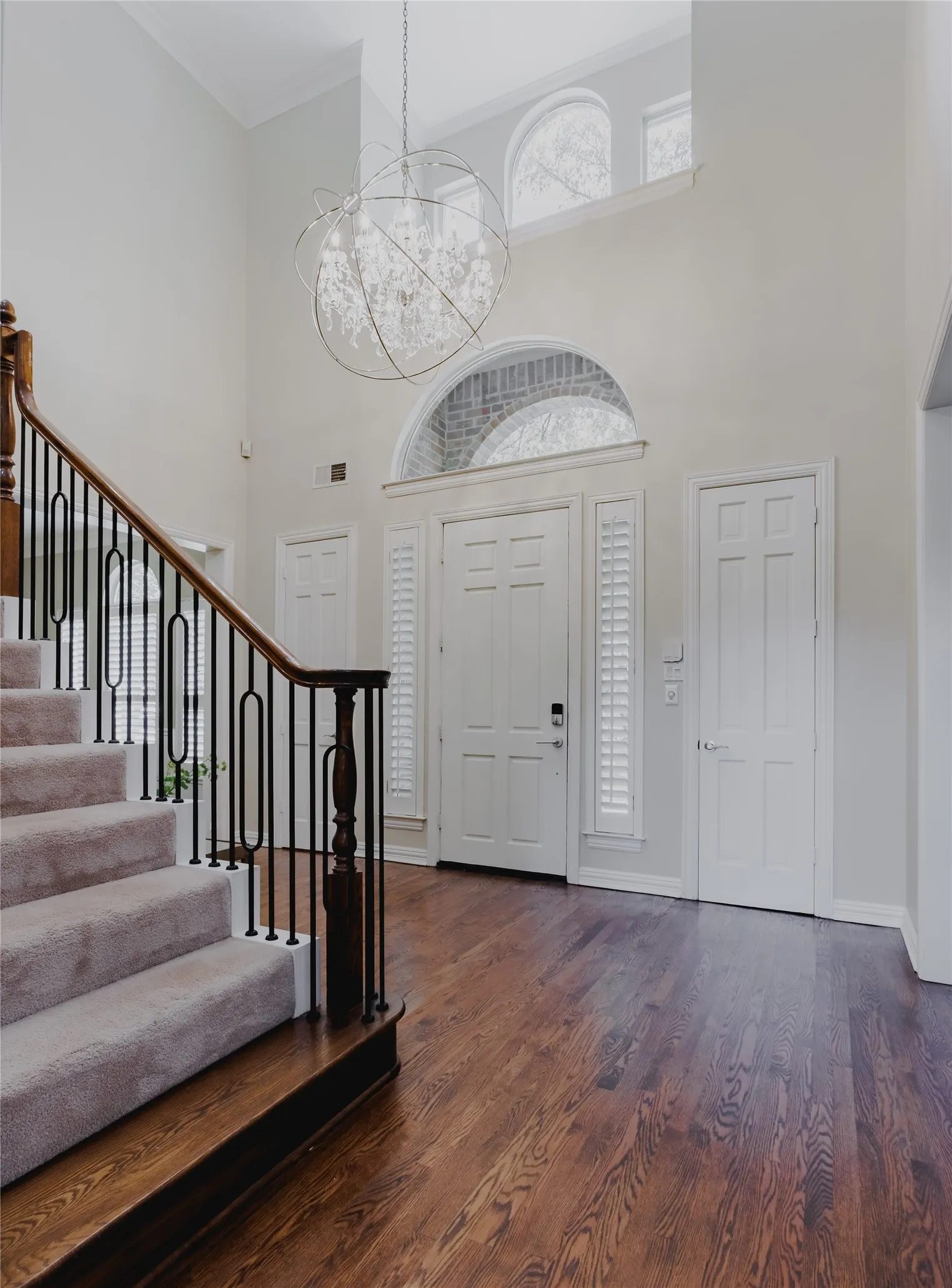 Beautiful Entry Lit by a Showpiece Light and Natural Lighting!