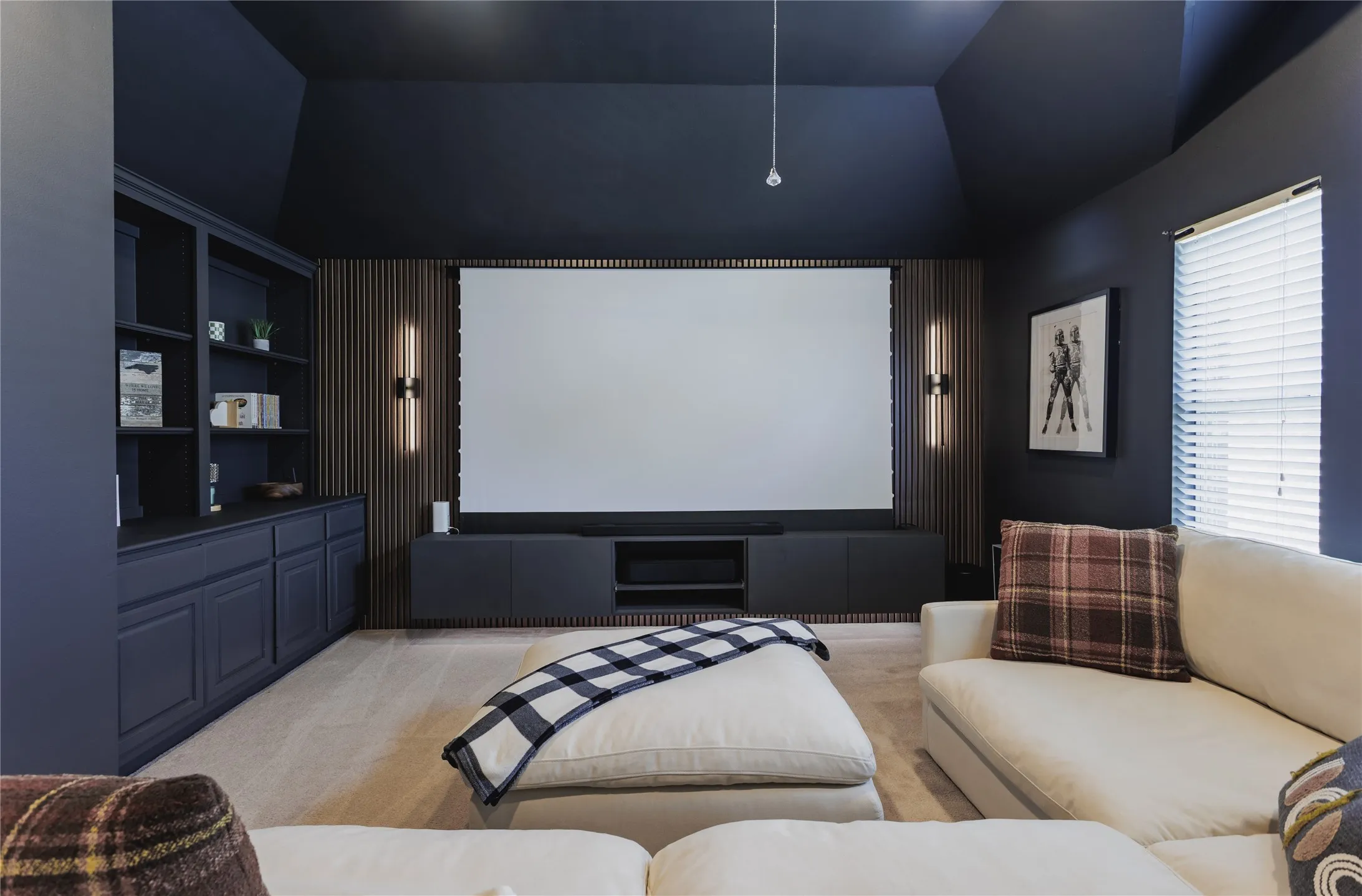 Check out the Media Room, with Remote Controlled Hidden Screen!