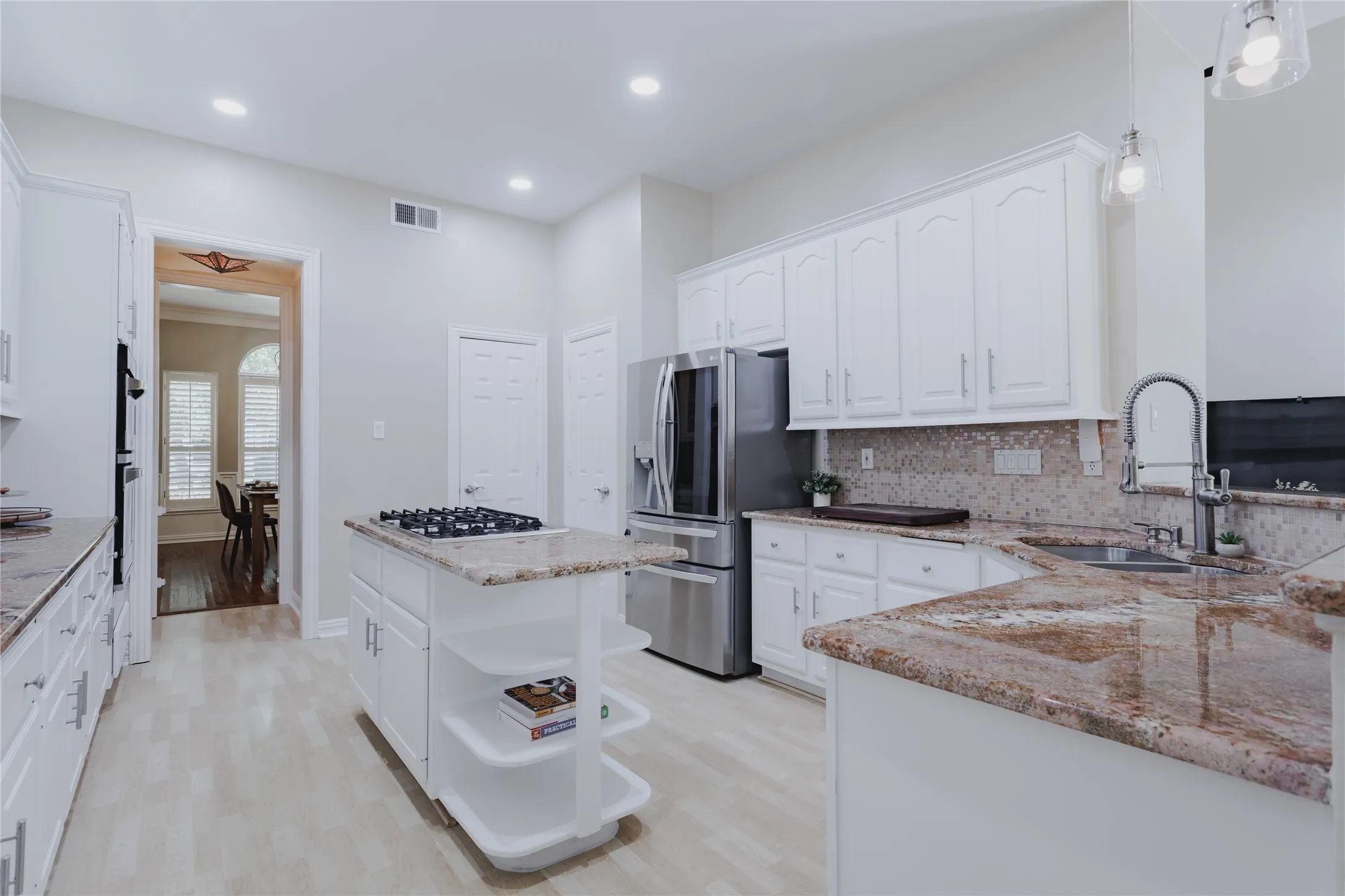 Spacious, Updated Kitchen with Granite, Stainless Appliances and Tons of Cabinet Storage!