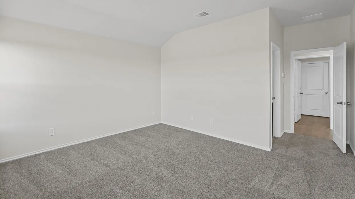 Neutral wall paint, gray carpet flooring, white trim, and white doors