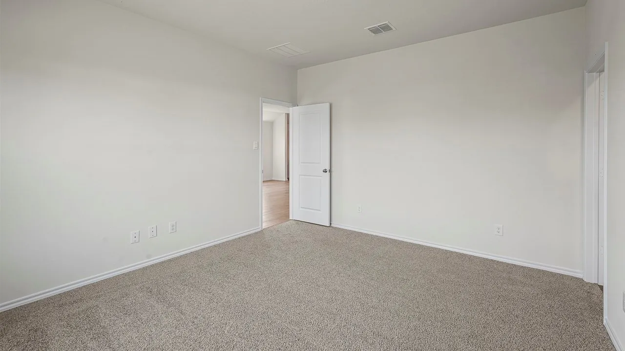 Neutral-toned carpeting throughout
