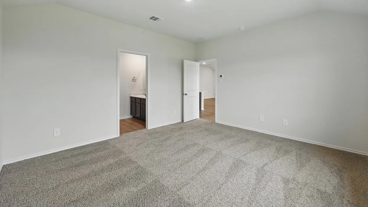Neutral color palette throughout, featuring plush carpeting