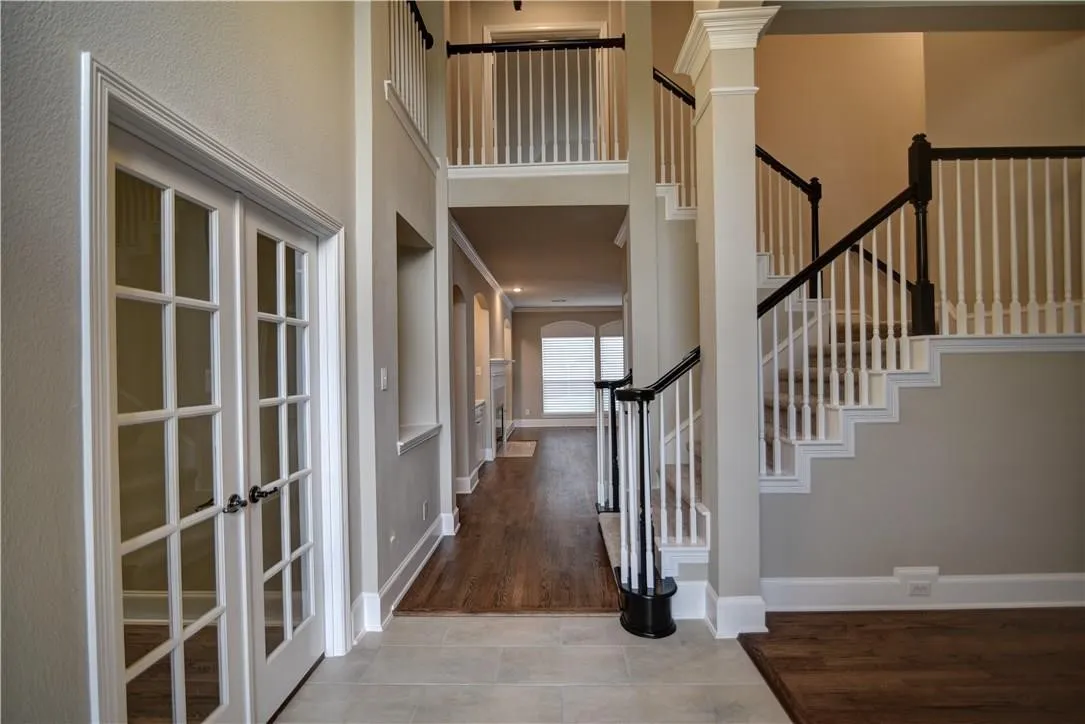 The home features 4 bedrooms, 3.5 baths, a private study, 3-car garage, multiple living and dining areas, and an oversized game room, providing an abundance of space and flexibility.