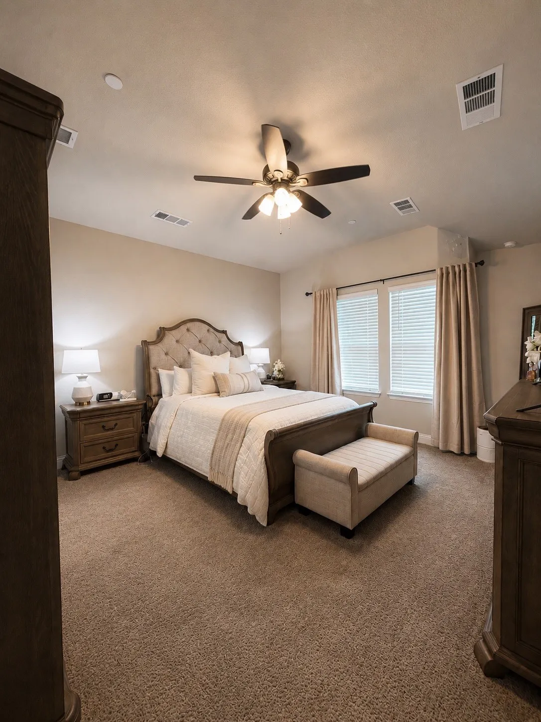 Recessed lighting, ceiling fan with integrated lighting, and dual windows