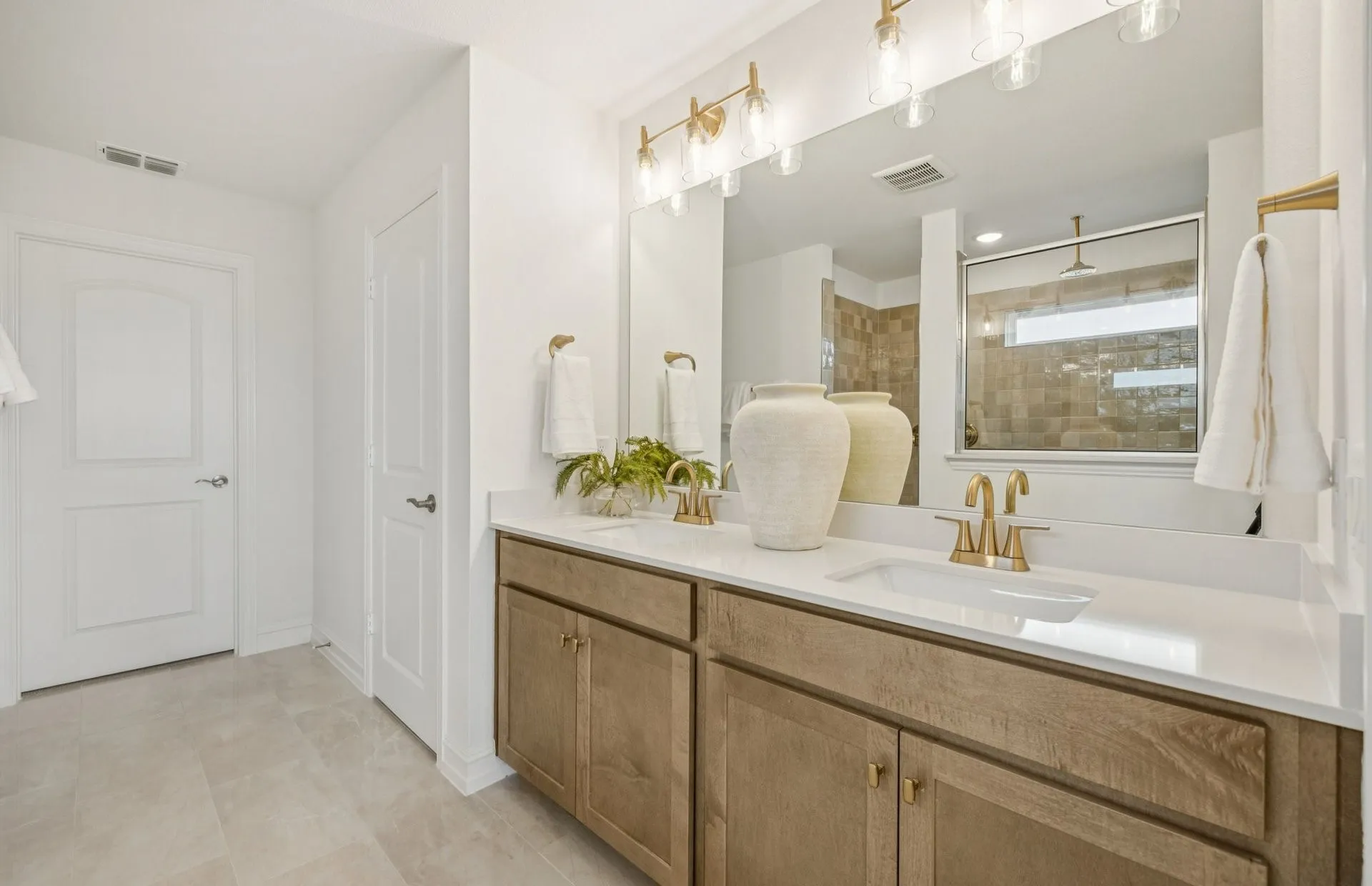 *Model Representation - Owner's private bath with double vanity