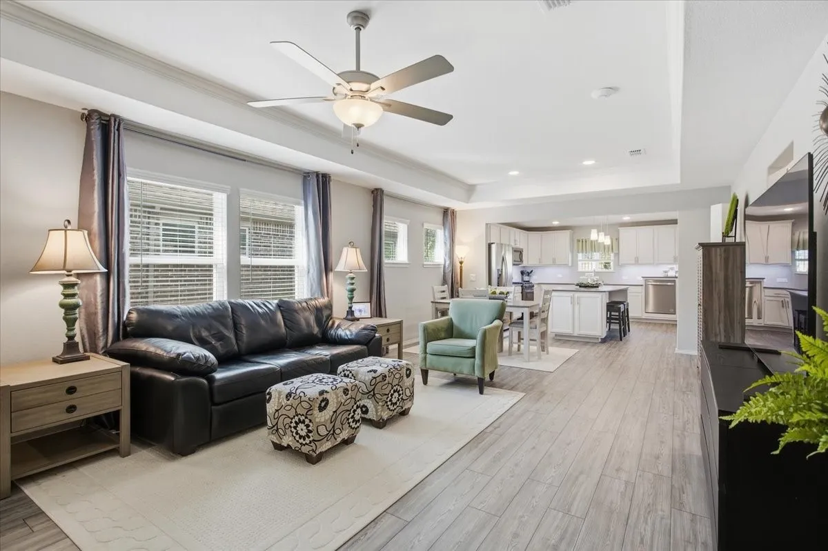 This room has an upgraded tray ceiling and beautiful luxury vinyl floors.
