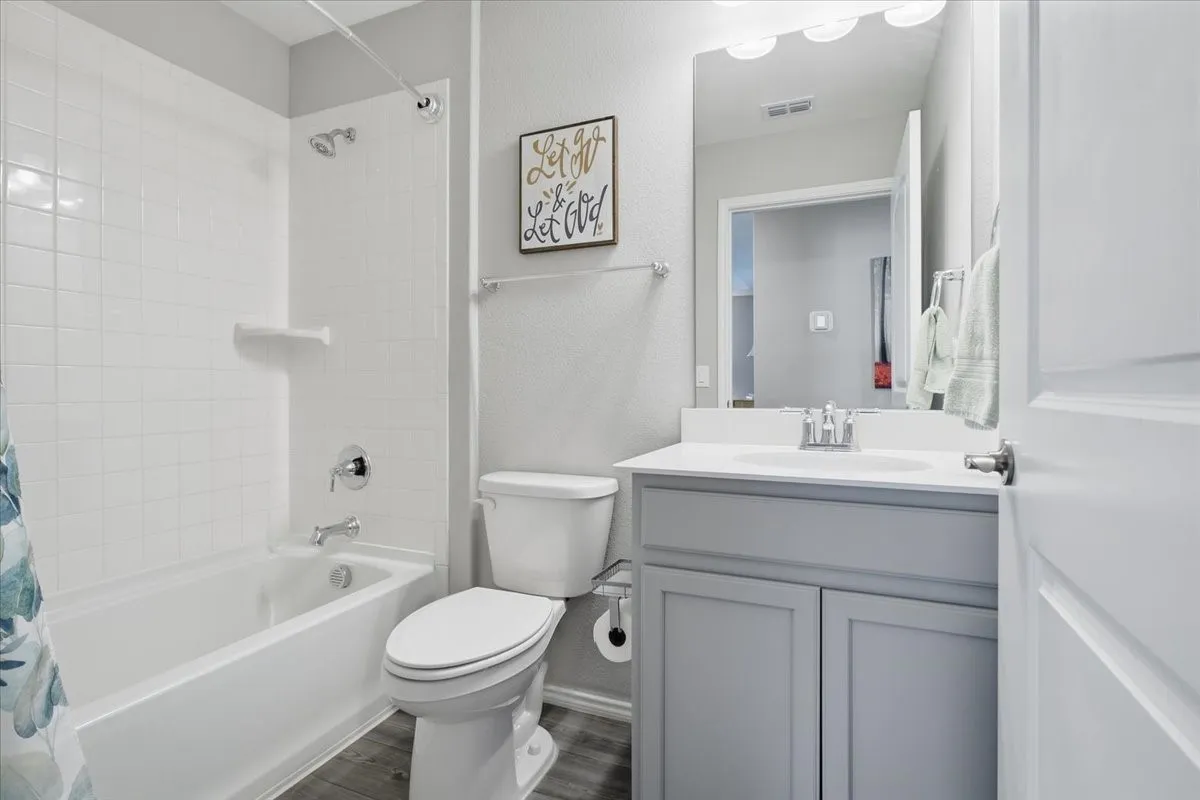 The secondary bath is perfect for guests.