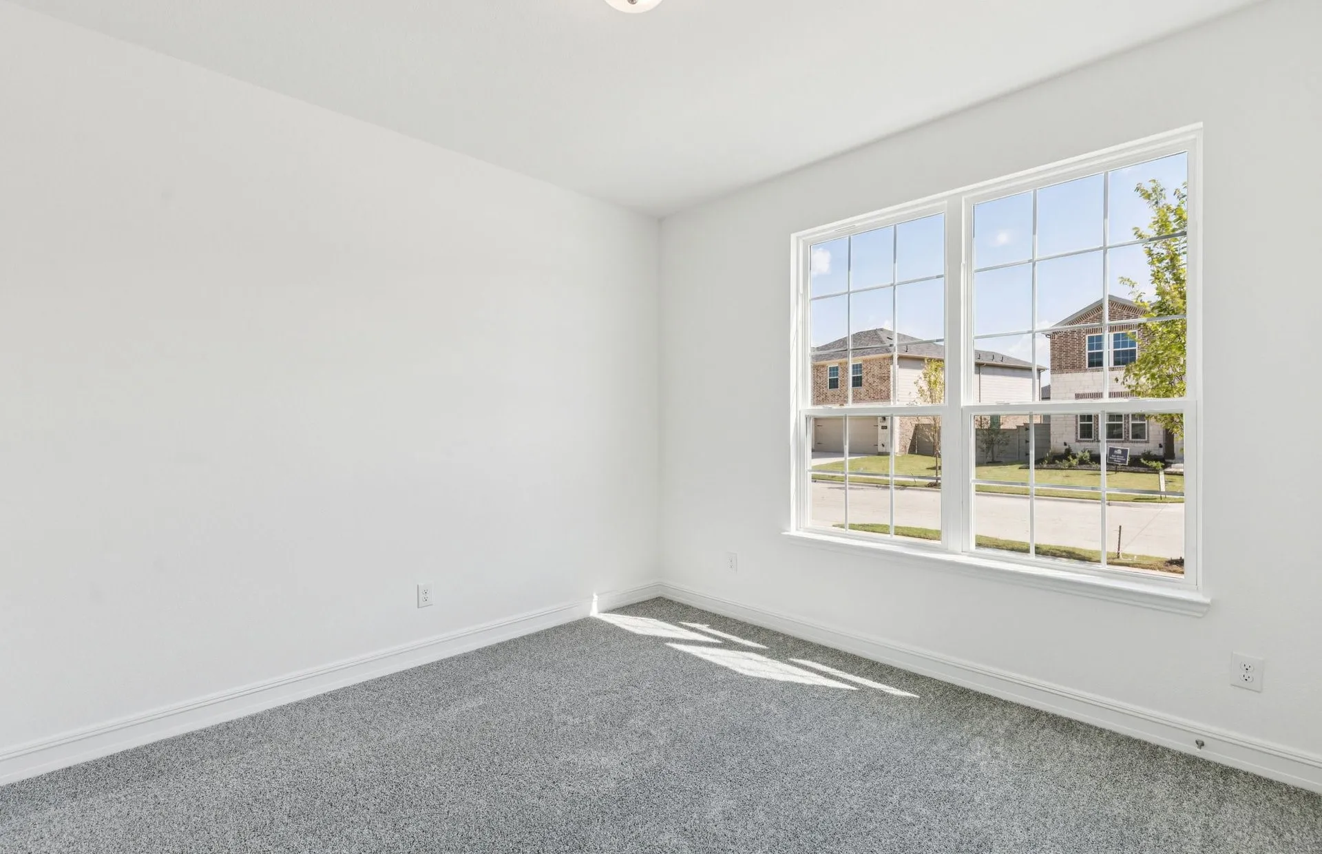 *Floorplan representation, not actual home - Spacious secondary bedroom with large windows