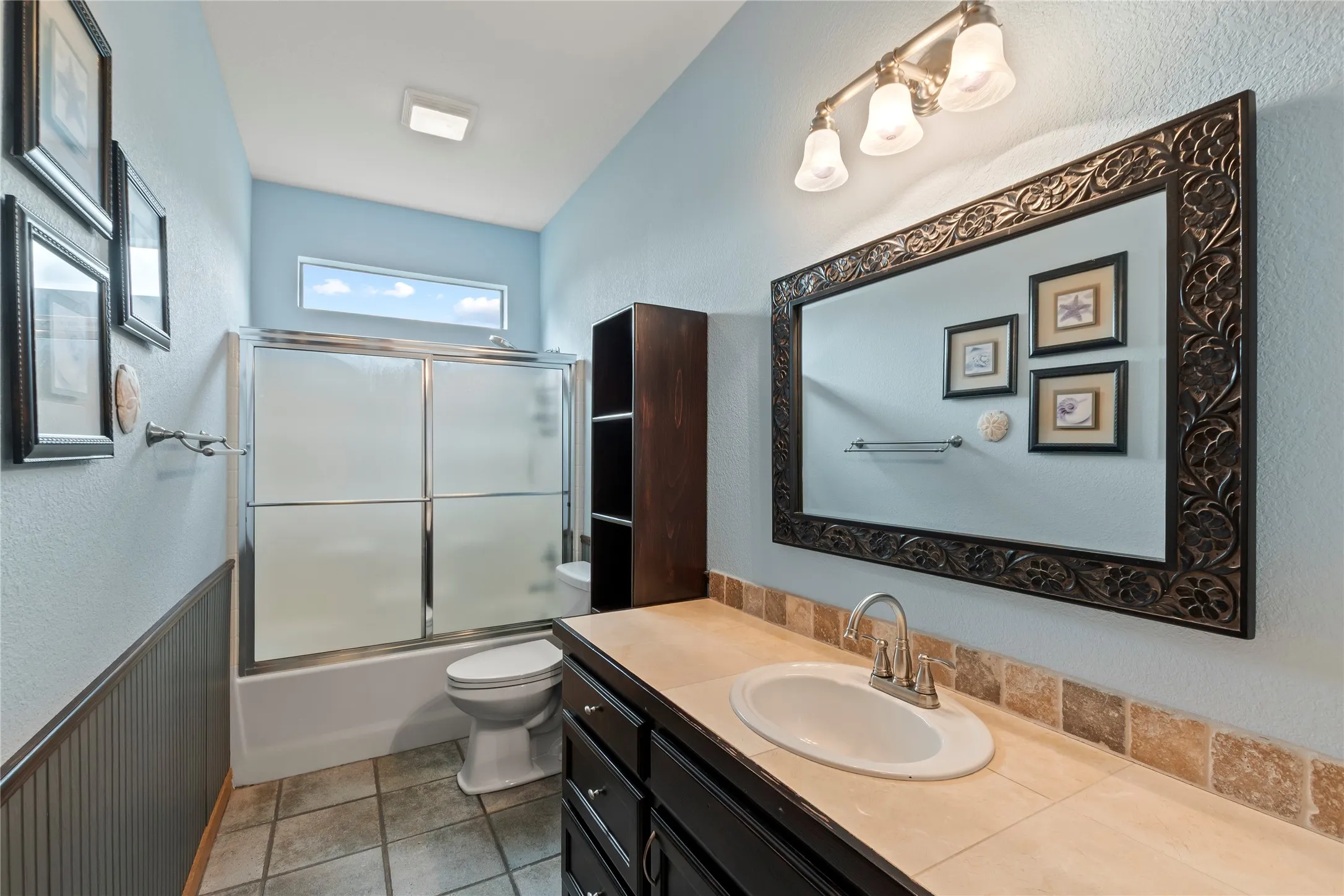Second Downstairs Full bath which serves bedrooms two and three.