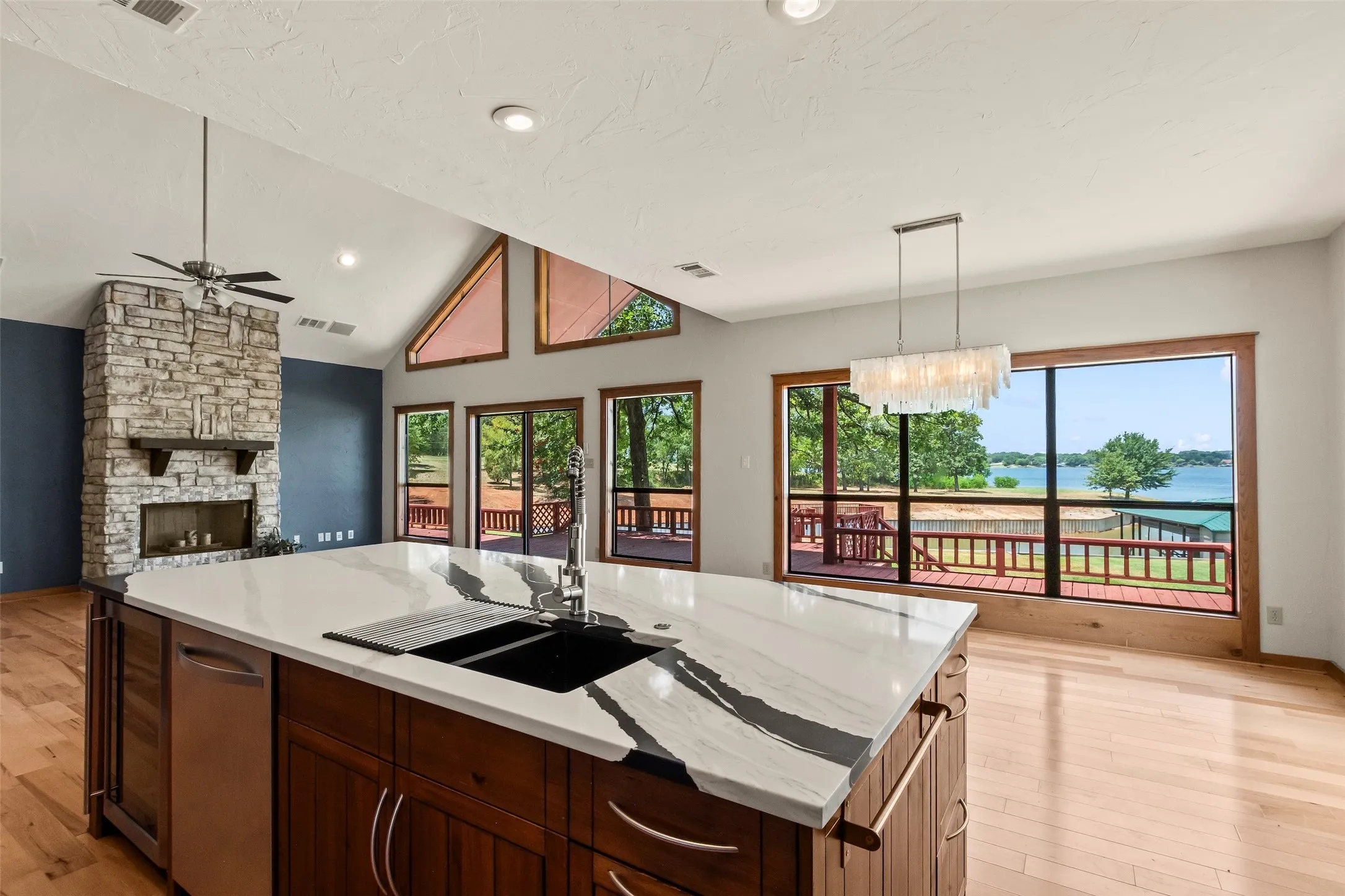 Stunning open water views from this expansive island with brand new countertops, sink, faucet.
