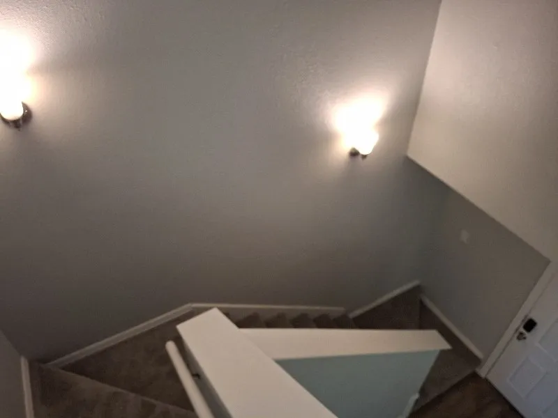 Stairway featuring baseboards
